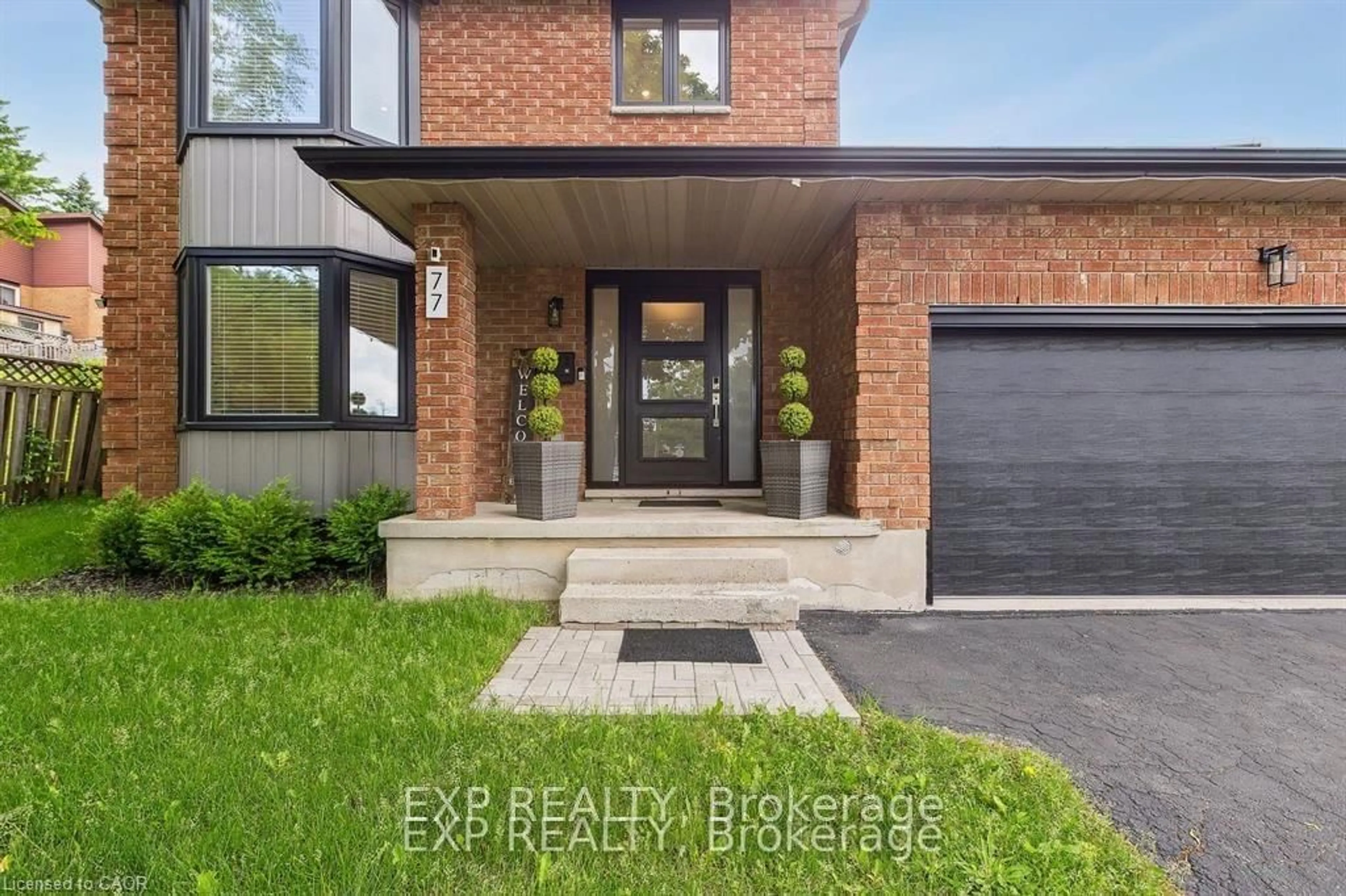 Home with brick exterior material, street for 77 Imperial Rd, Guelph Ontario N1H 8A1