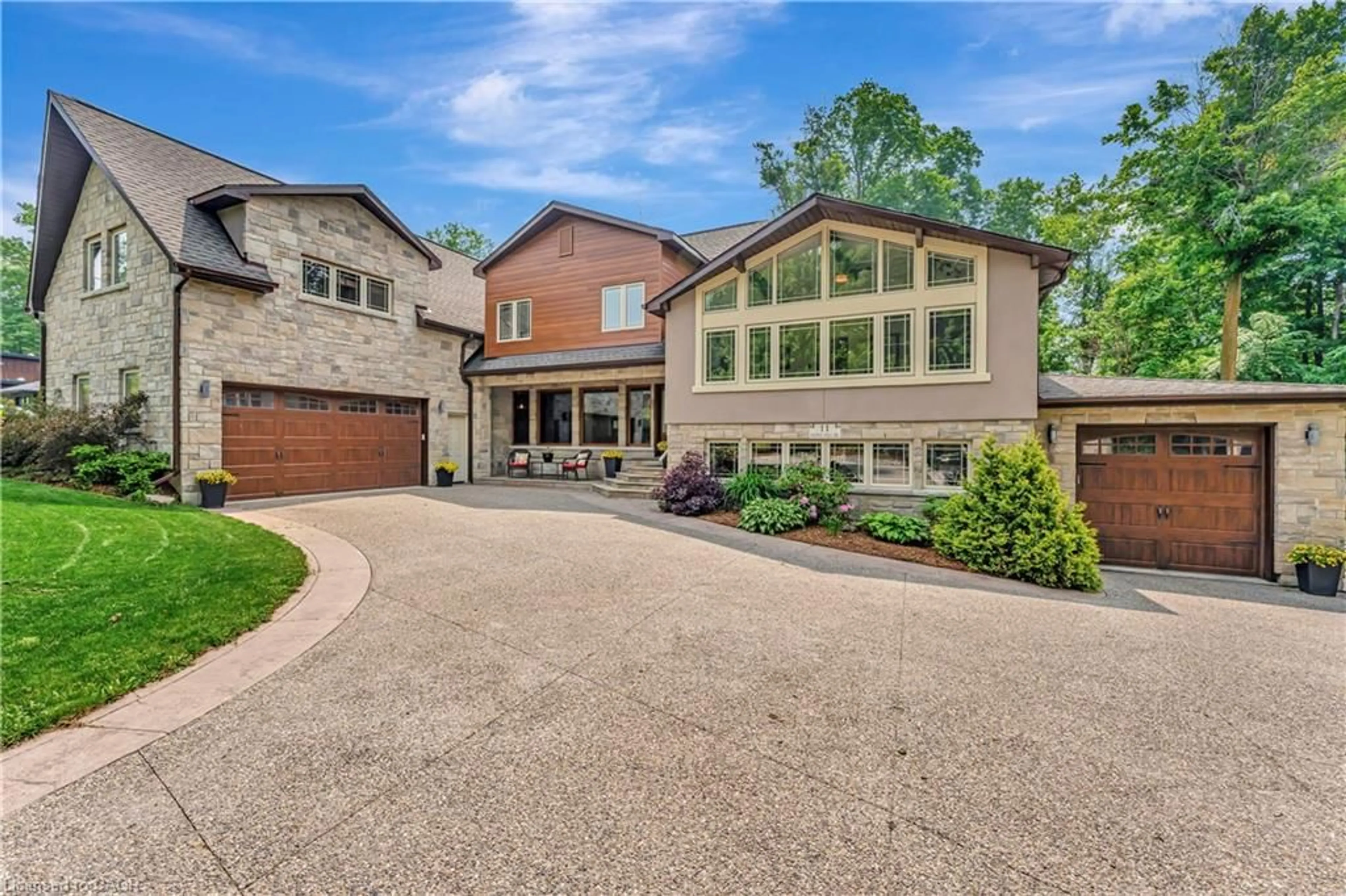 Home with brick exterior material, street for 11 Maple Hill Dr, Kitchener Ontario N2M 2R7