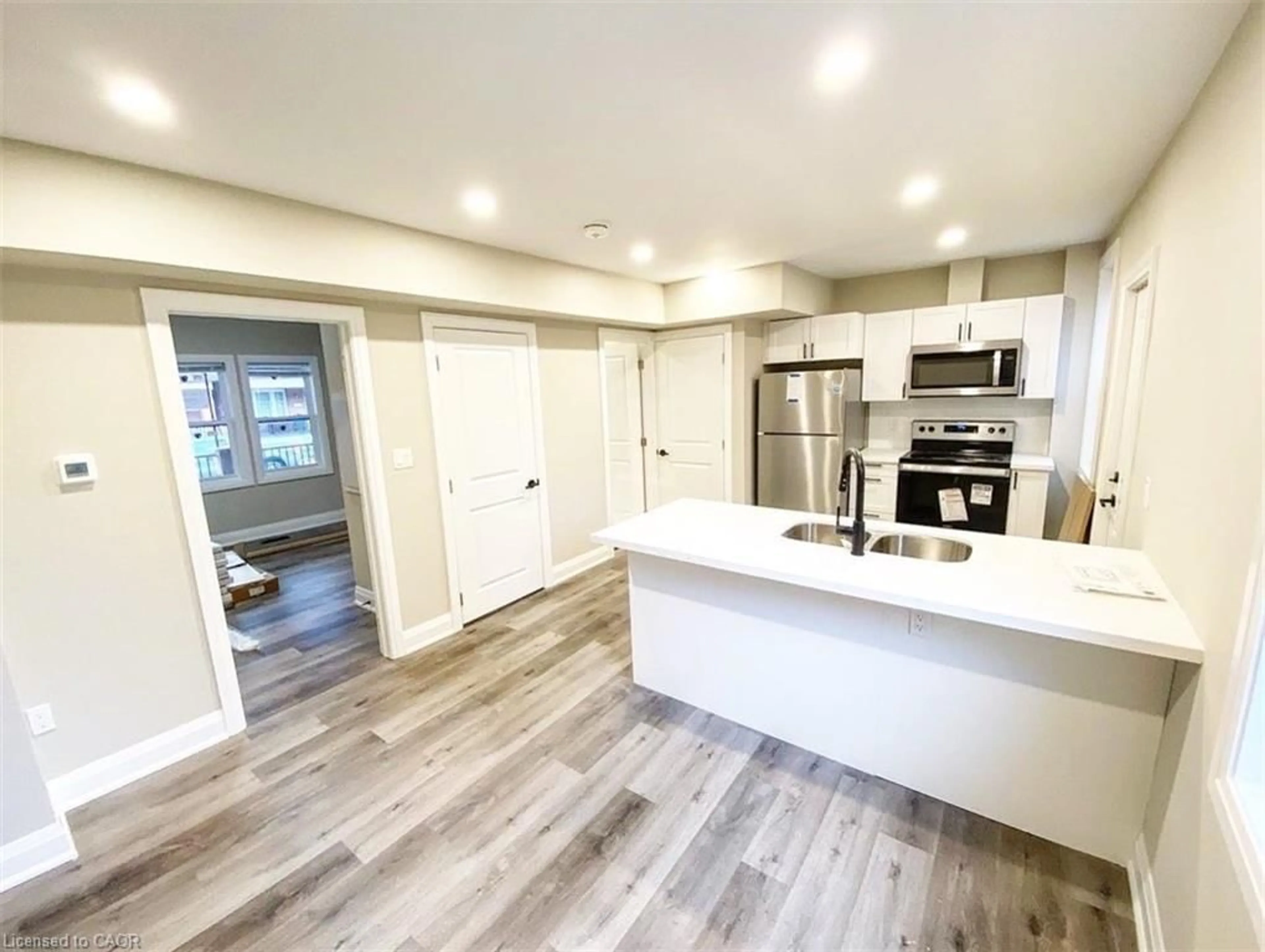 Open concept kitchen, unknown for 574 Cannon St, Hamilton Ontario L8L 2G4
