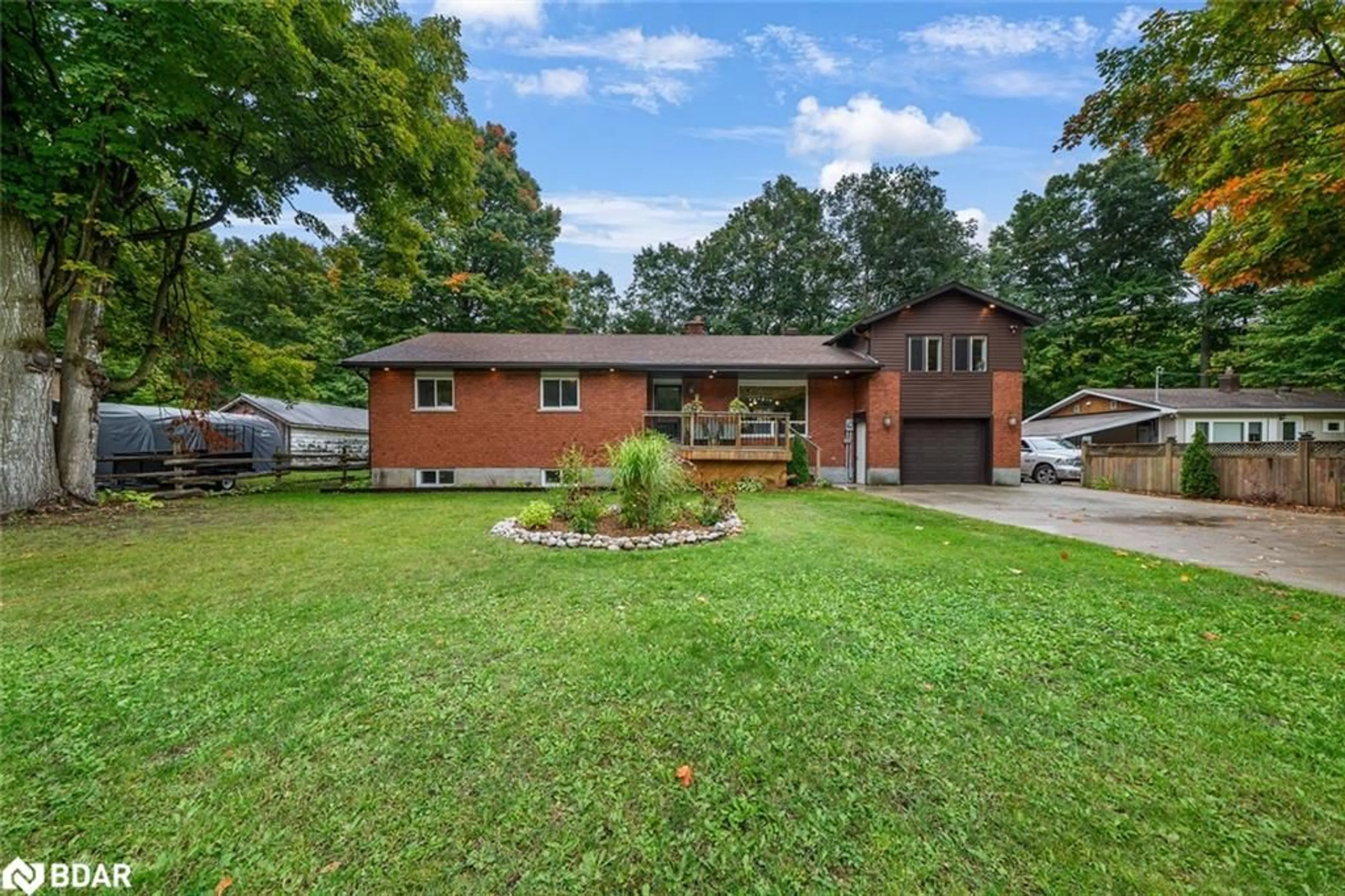 Home with brick exterior material, street for 15 Mundy Ave, Tiny Ontario L9M 0B5