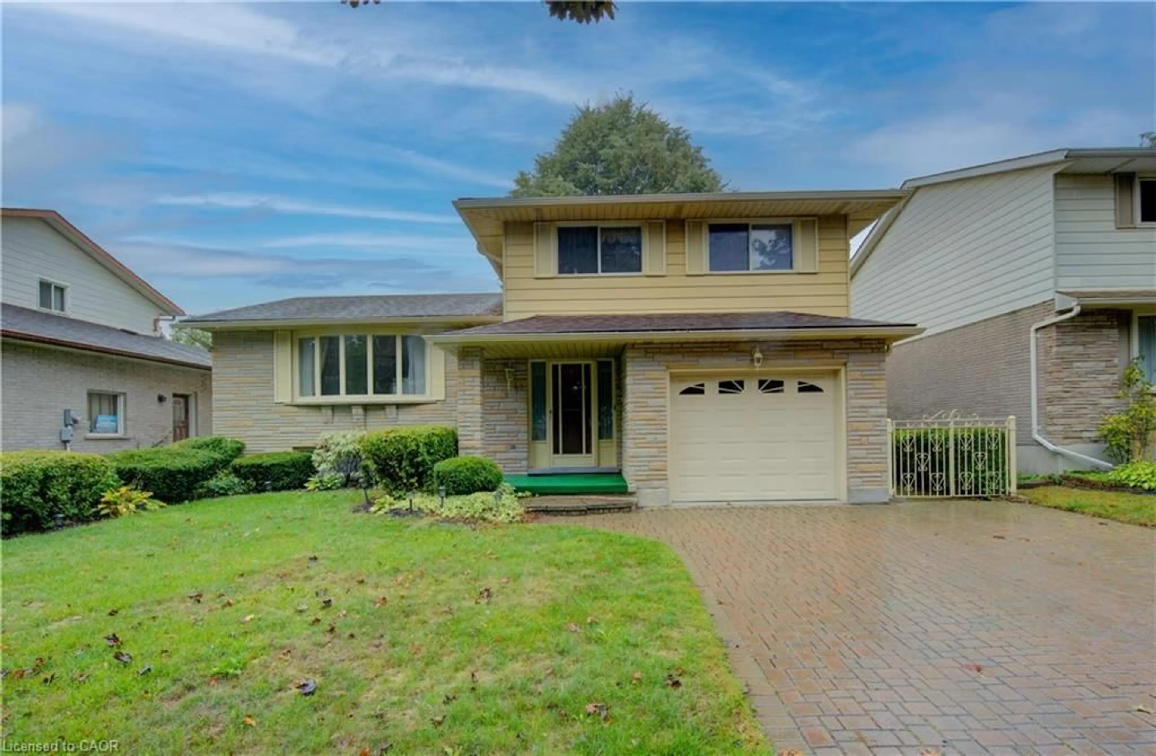 Home with vinyl exterior material, street for 45 Wimbleton Cres, Kitchener Ontario N2B 3K4