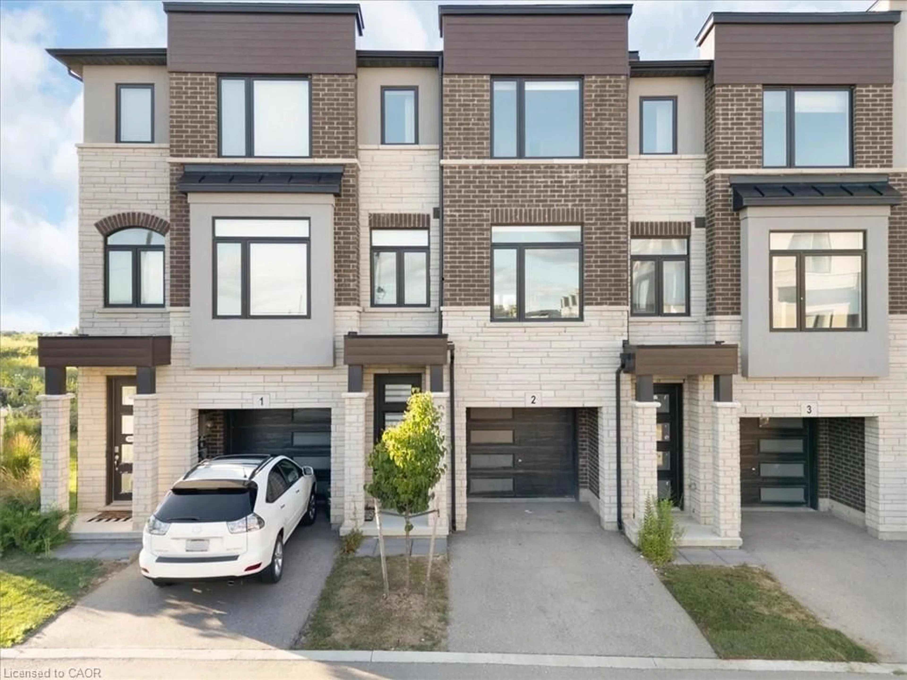 Home with brick exterior material, street for 314 Equestrian Way #2, Cambridge Ontario N3E 0E4