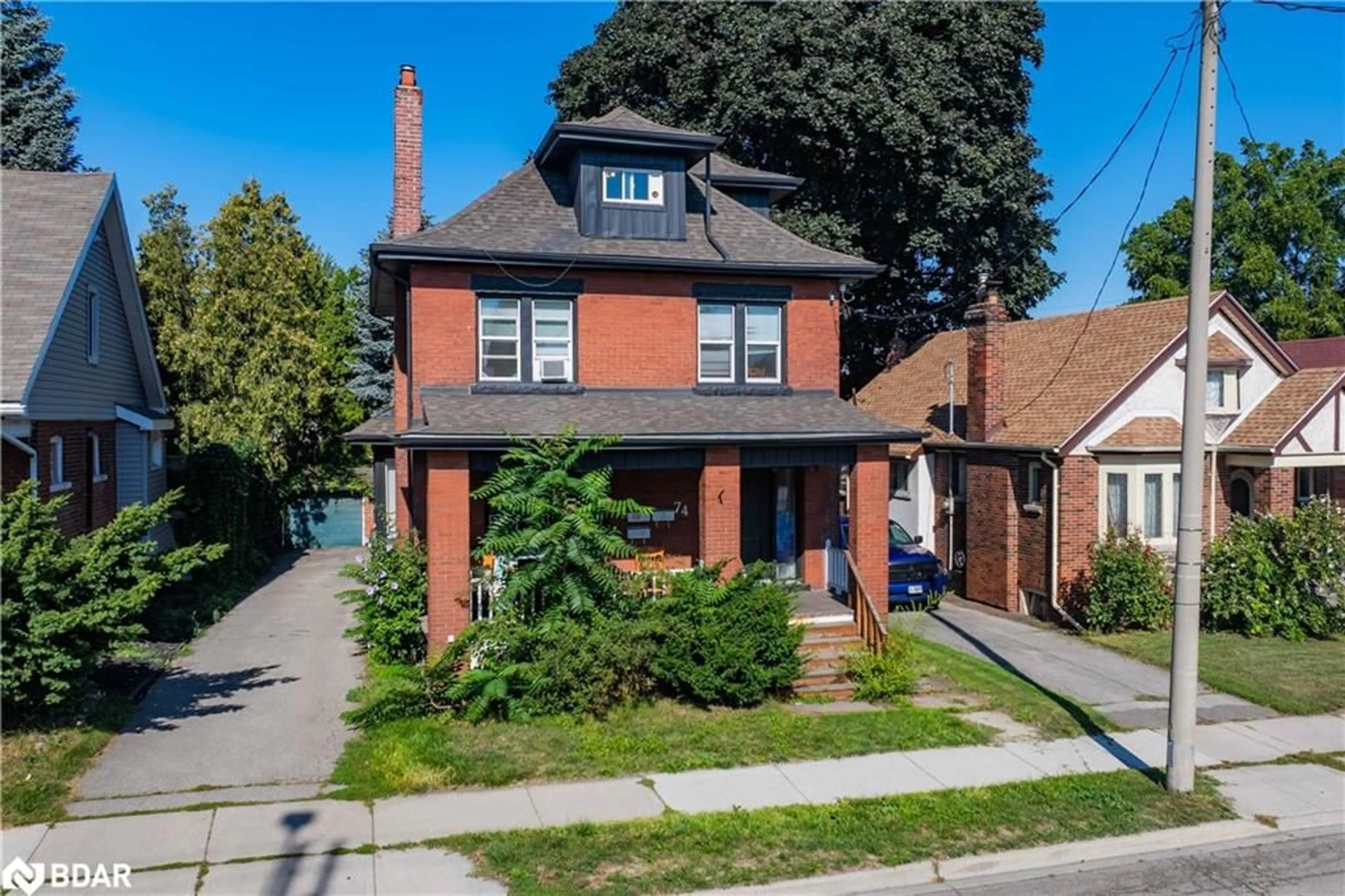 Home with brick exterior material, street for 74 Kenilworth Ave, Hamilton Ontario L8K 2S9