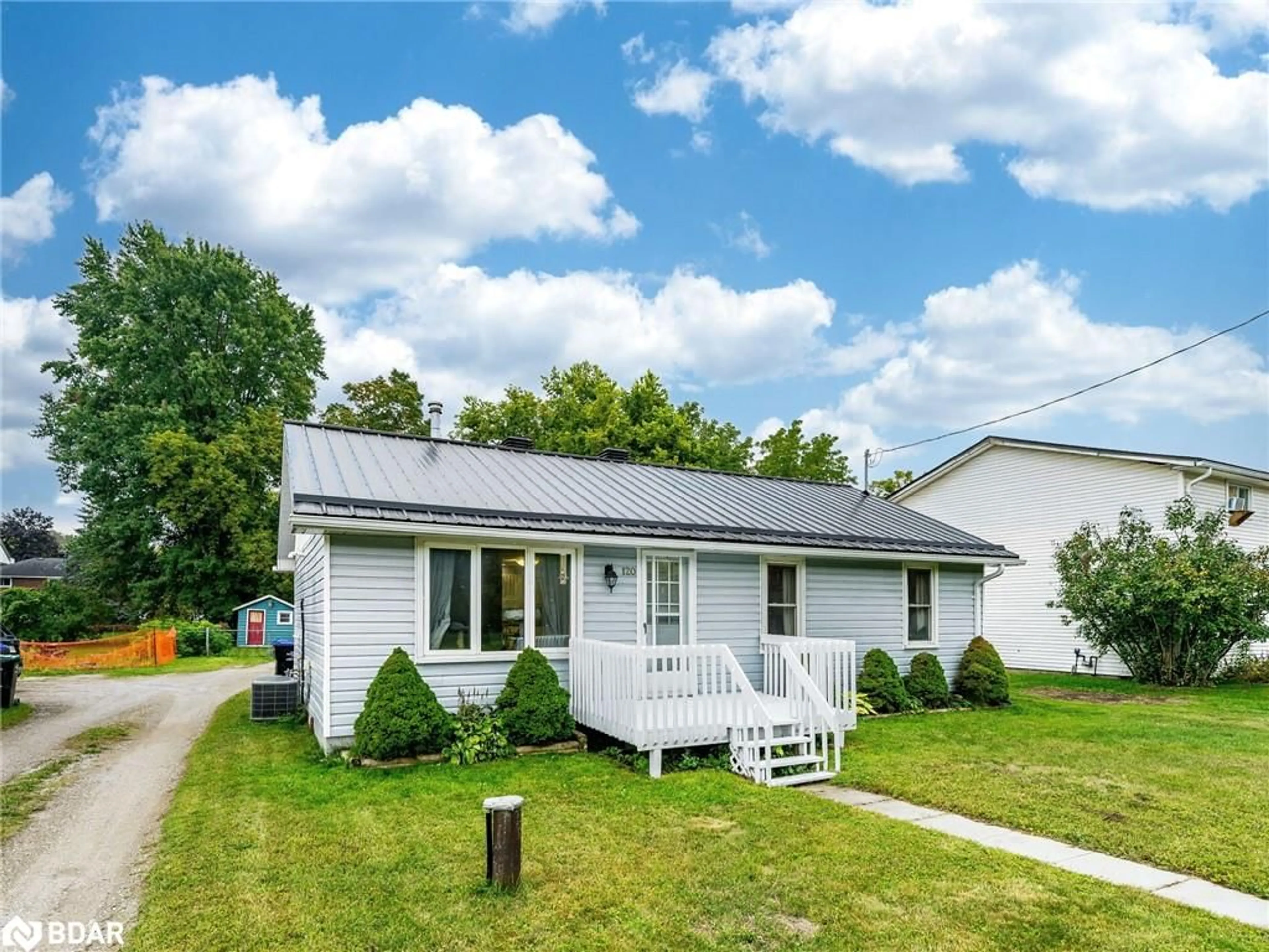 Home with vinyl exterior material, street for 120 Queen St, Angus Ontario L0M 1B0
