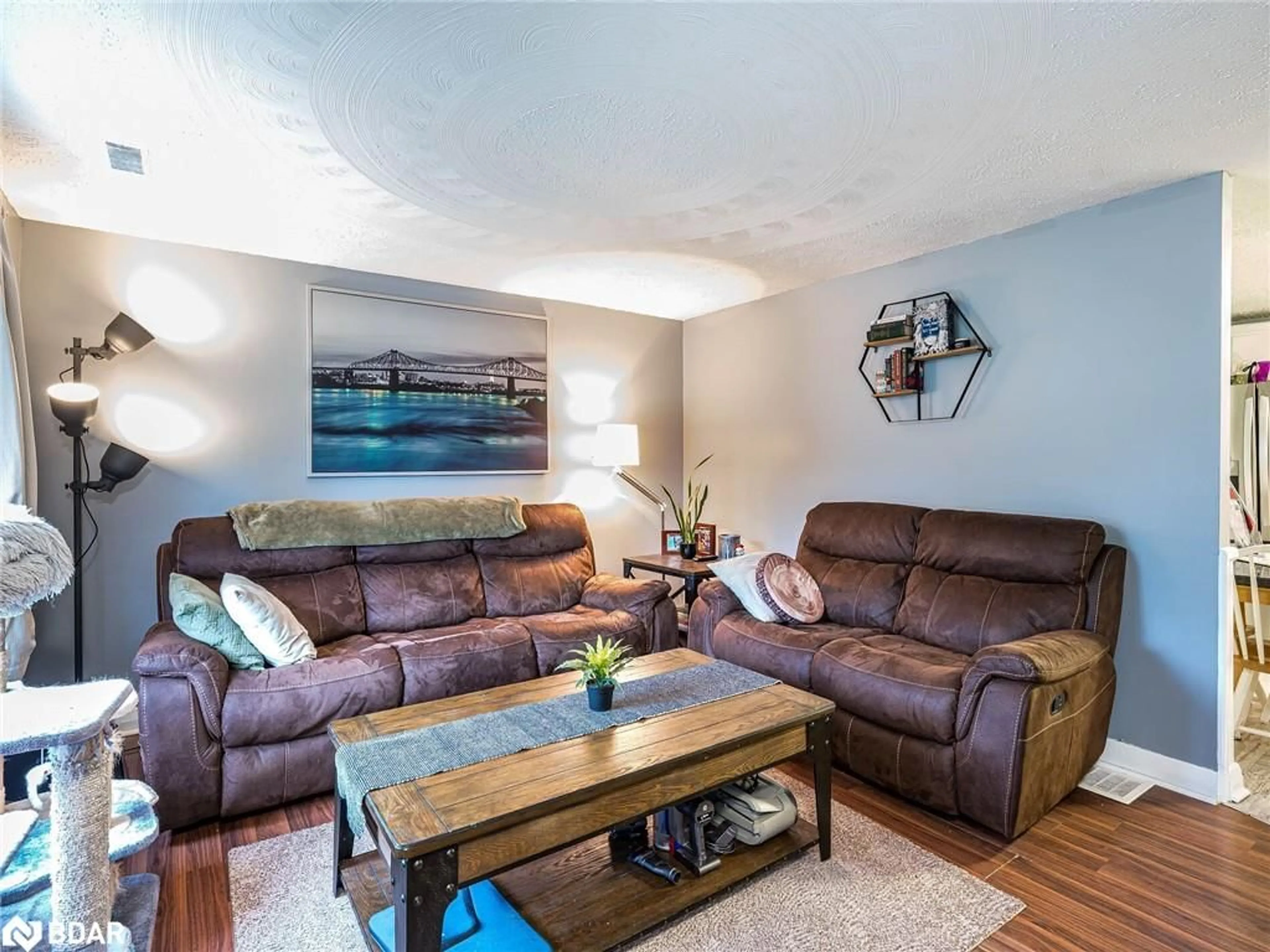 Living room with furniture, wood/laminate floor for 120 Queen St, Angus Ontario L0M 1B0