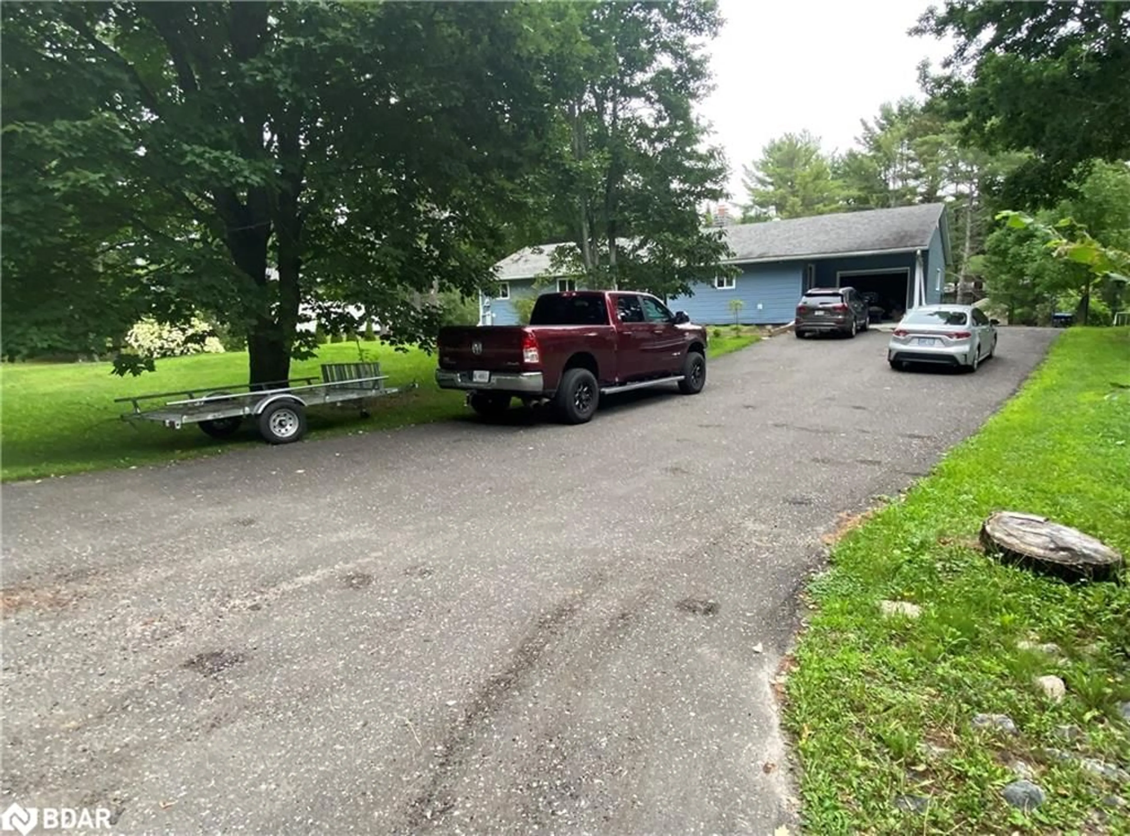 A pic from outside/outdoor area/front of a property/back of a property/a pic from drone, street for 105 Frederick St, Bracebridge Ontario P1L 0A1