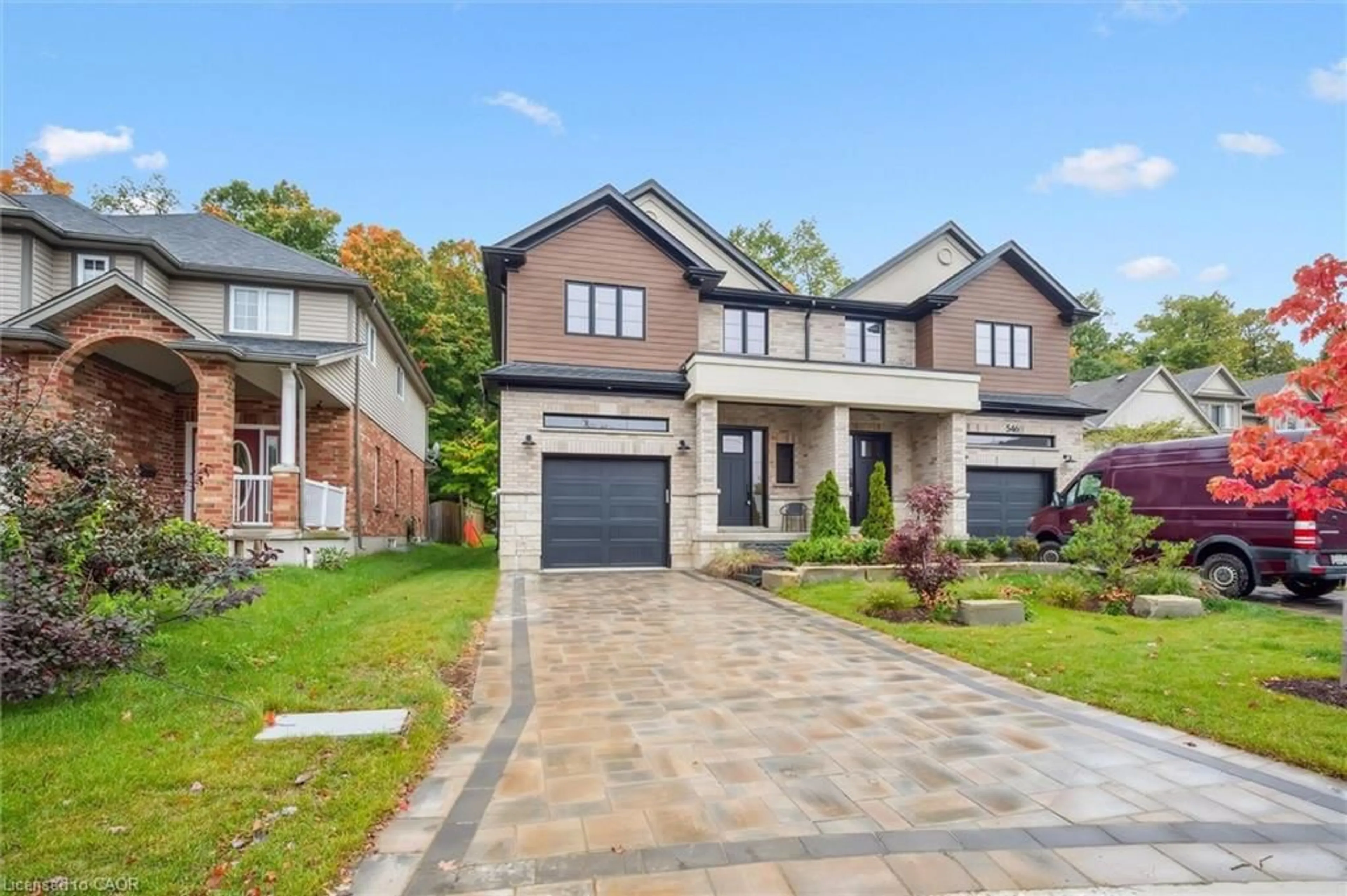 Home with brick exterior material, street for 548 Peach Blossom Crt, Kitchener Ontario N2E 3Z9