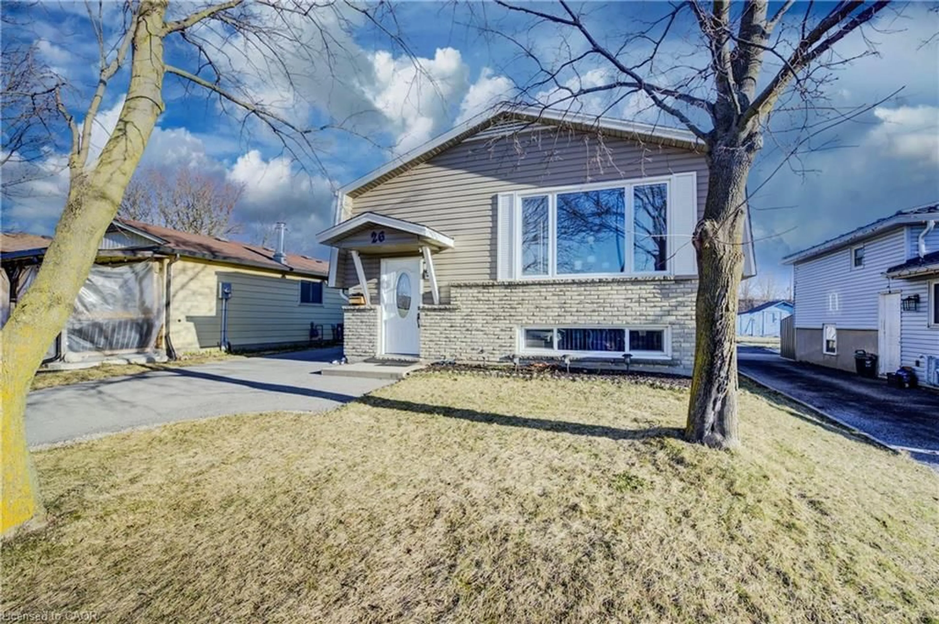 Home with brick exterior material, street for 26 Cluthe Cres, Kitchener Ontario N2P 1M8