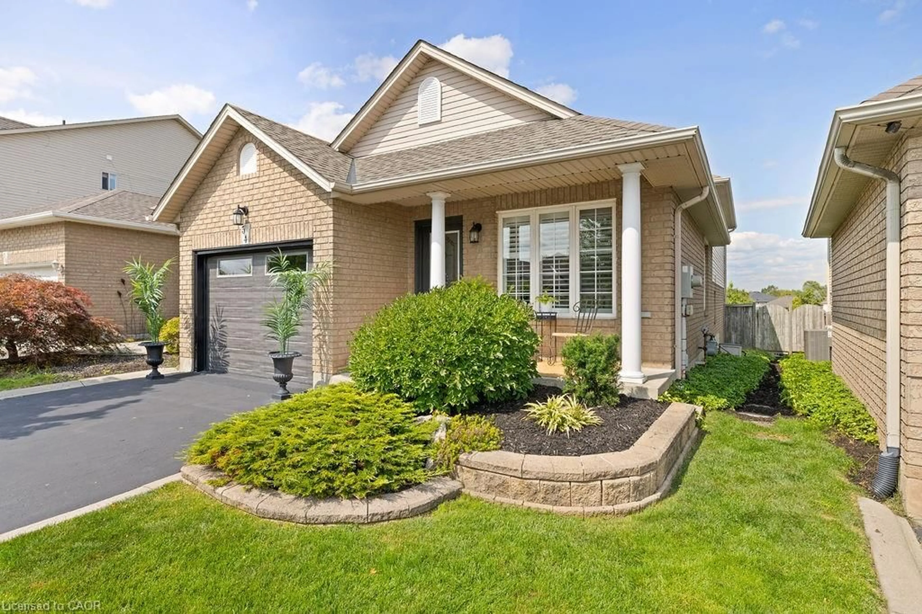 Home with brick exterior material, street for 54 Briarose Pl, Hamilton Ontario L9C 7V3