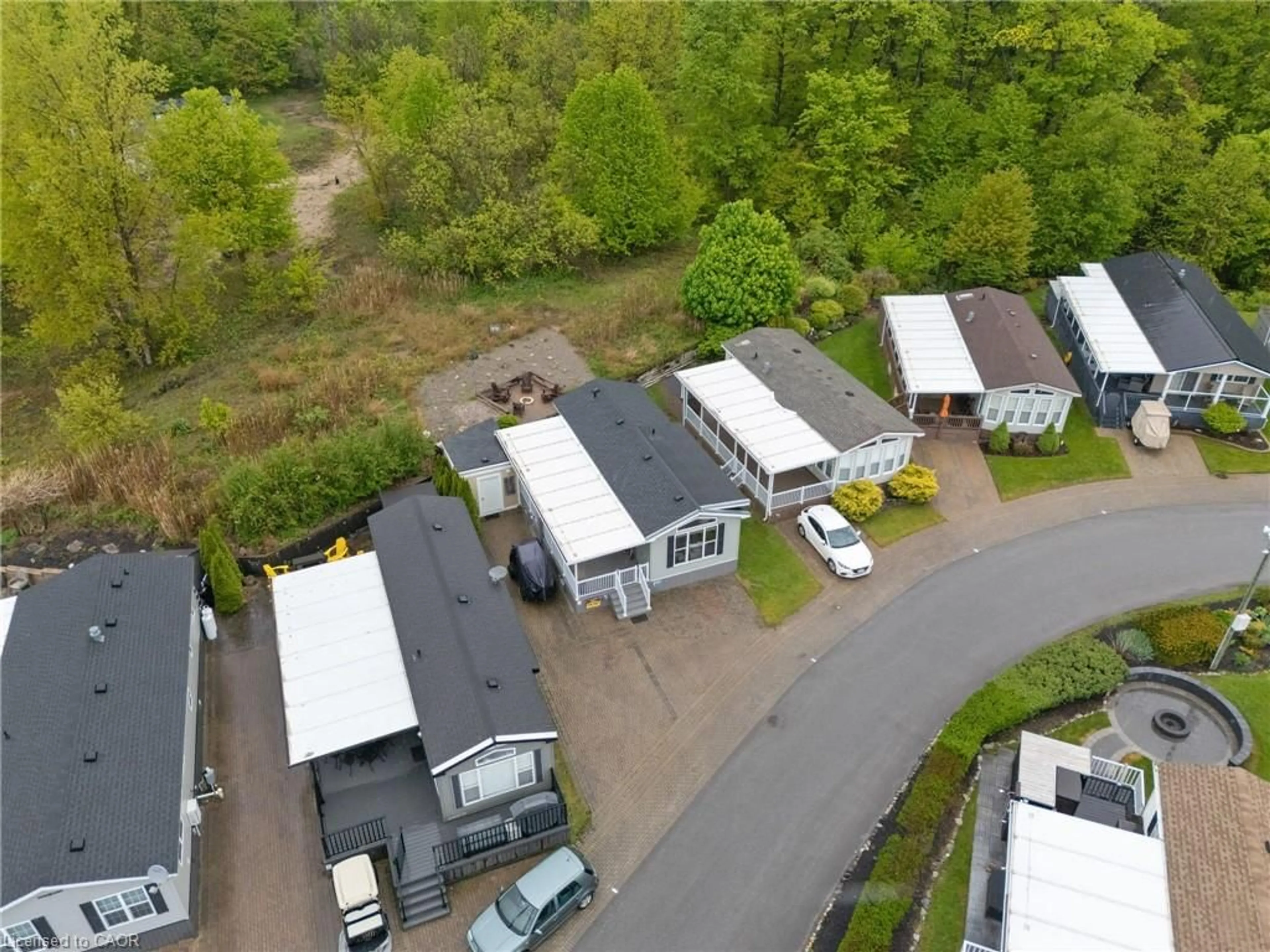 A pic from outside/outdoor area/front of a property/back of a property/a pic from drone, street for 490 Empire Rd #213, Sherkston Ontario L0S 1R0