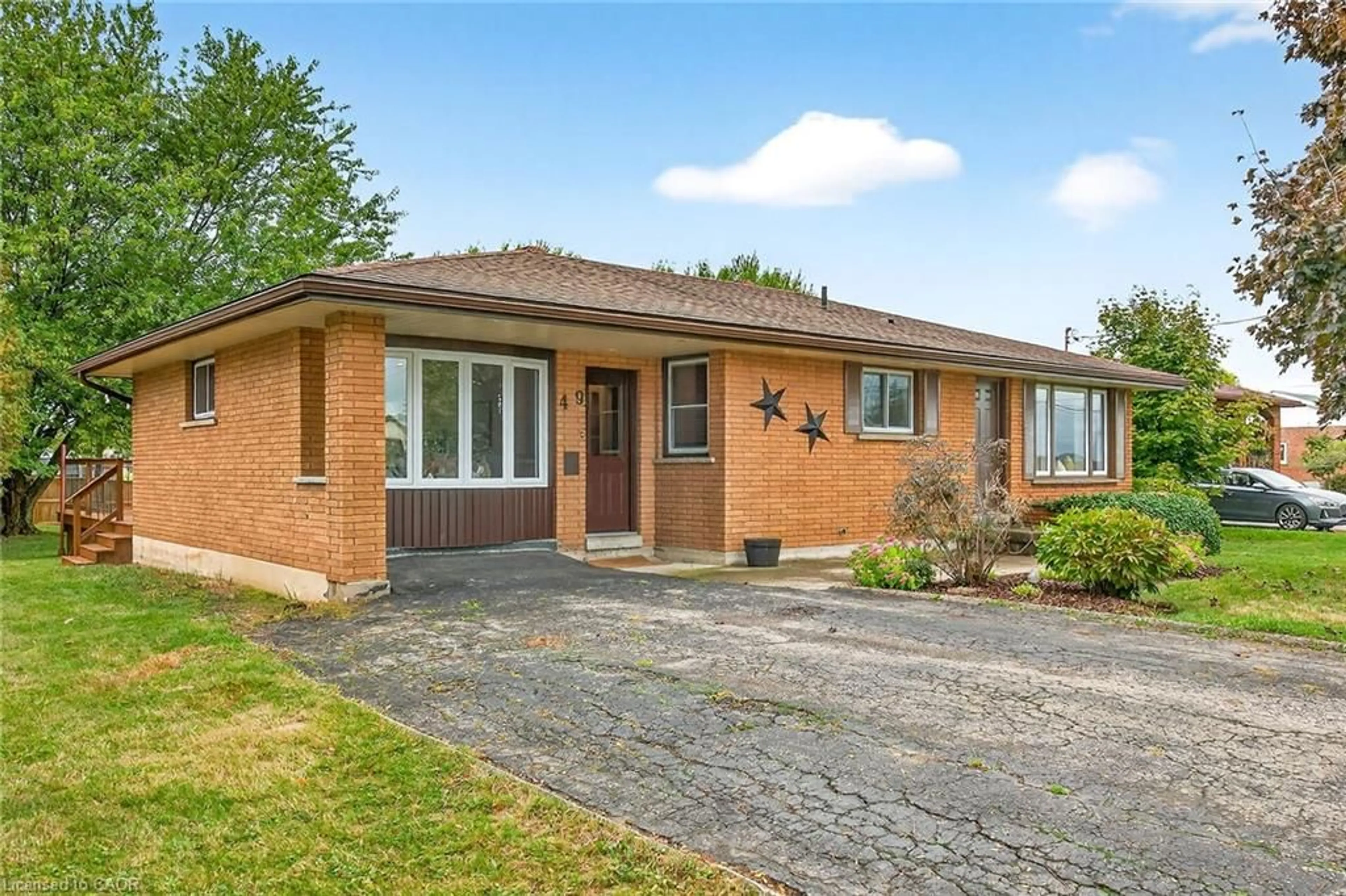 Home with brick exterior material, street for 49 Erie Ave, Fisherville Ontario N0A 1G0