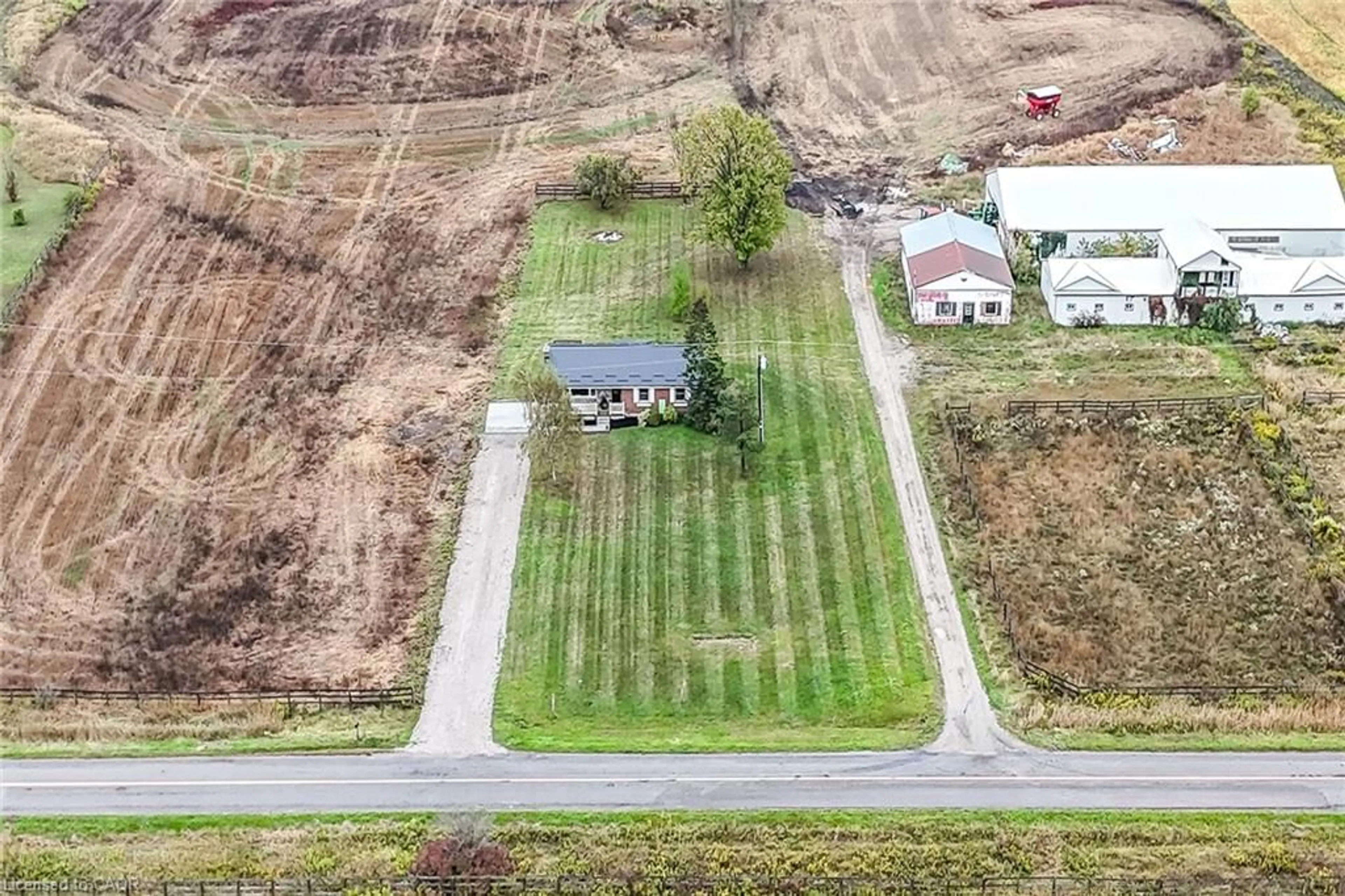 A pic from outside/outdoor area/front of a property/back of a property/a pic from drone, street for 1000 Conc 2 Rd, York Ontario N0A 1R0