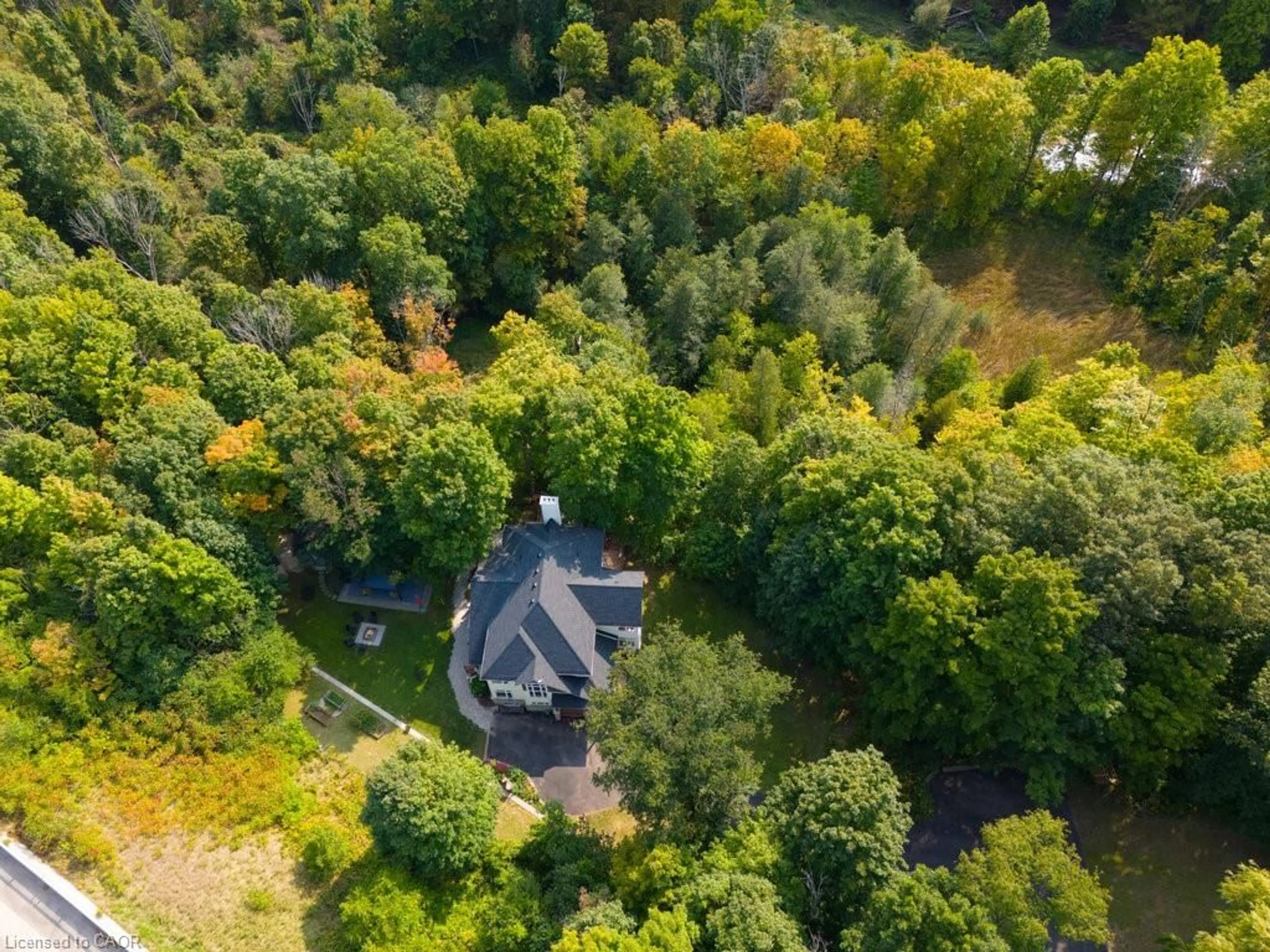A pic from outside/outdoor area/front of a property/back of a property/a pic from drone, forest/trees view for 1200 Bronte Rd, Oakville Ontario L6M 4G4