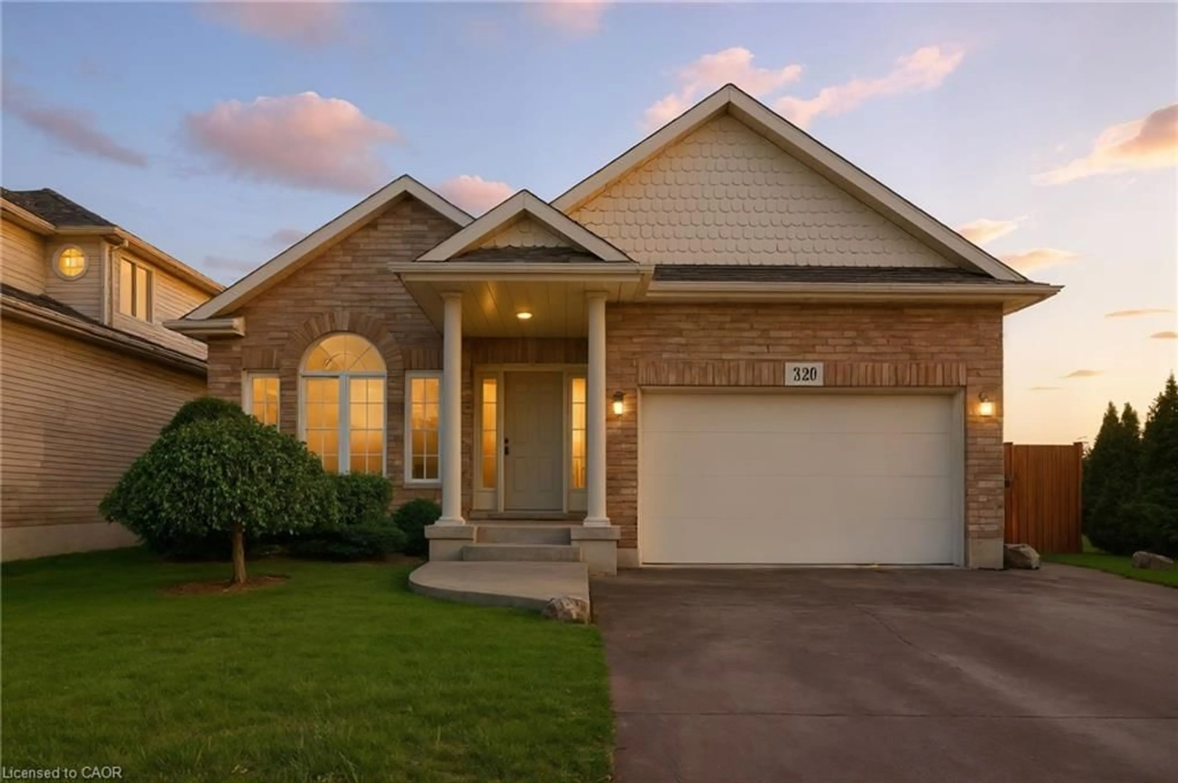 Home with brick exterior material, street for 320 Winterberry Blvd, Thorold Ontario L2V 5E6