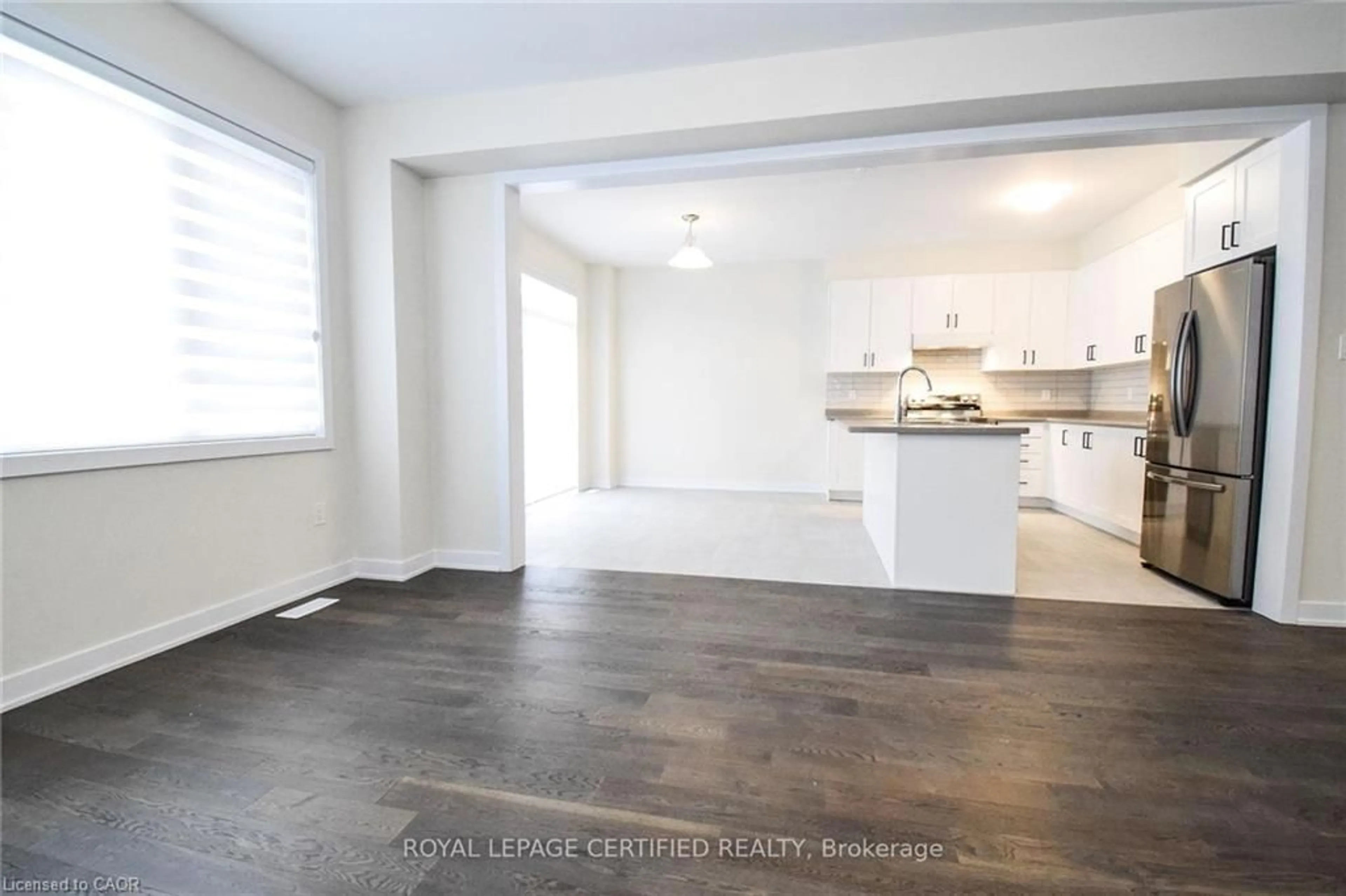 Open concept kitchen, wood/laminate floor for 22 Stern Dr, Welland Ontario L3B 0M2