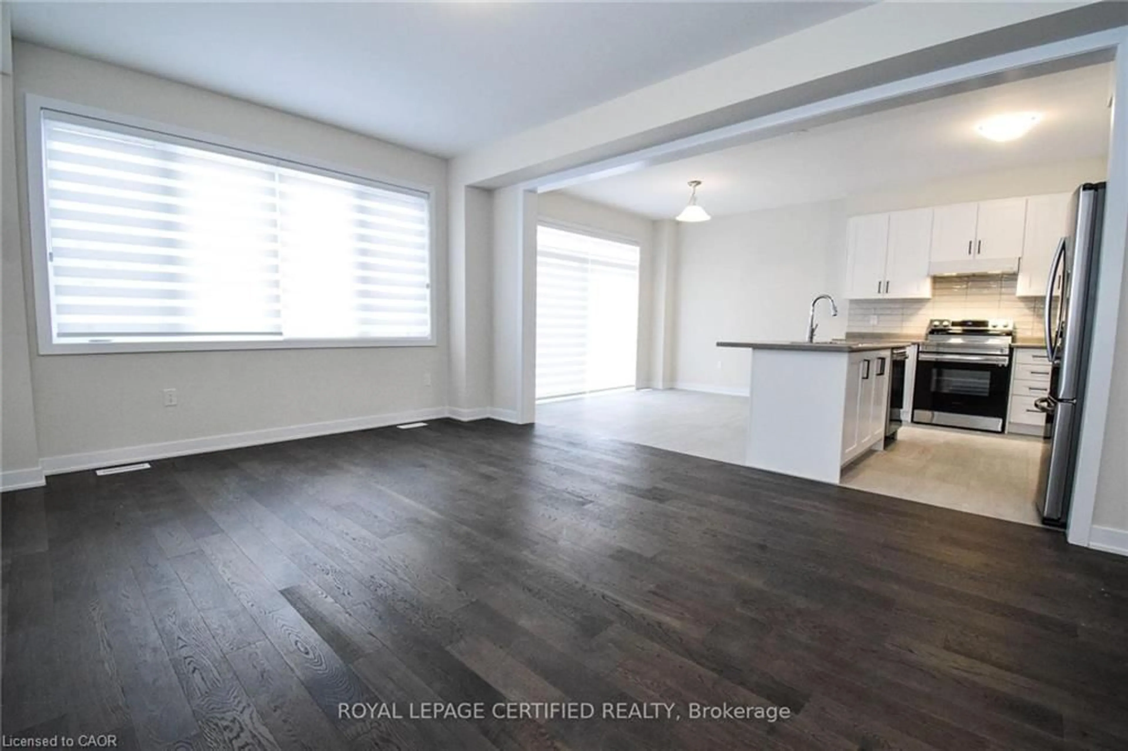 Open concept kitchen, wood/laminate floor for 22 Stern Dr, Welland Ontario L3B 0M2