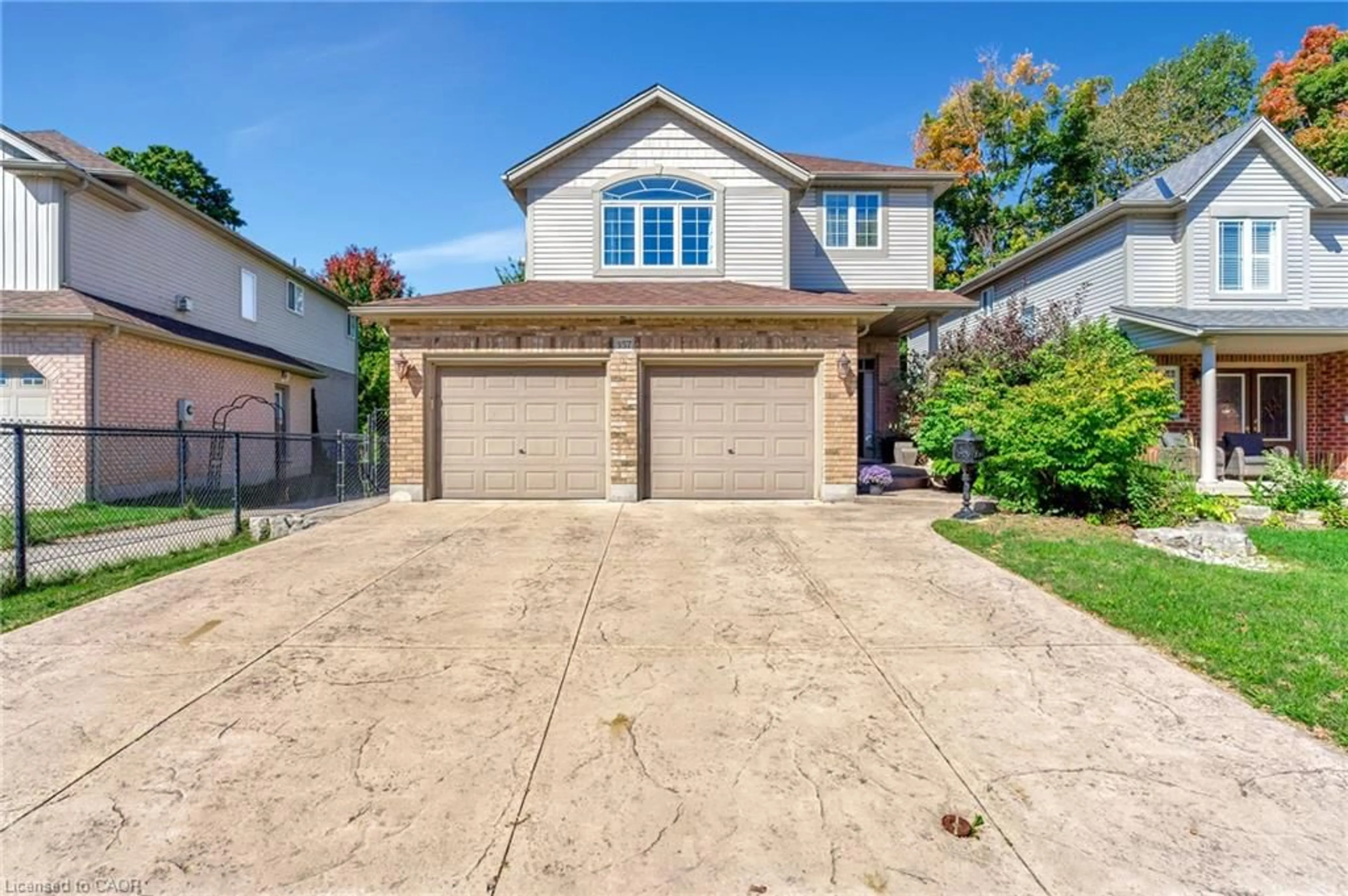 Home with vinyl exterior material, street for 357 Auburn Dr, Waterloo Ontario N2K 4P3