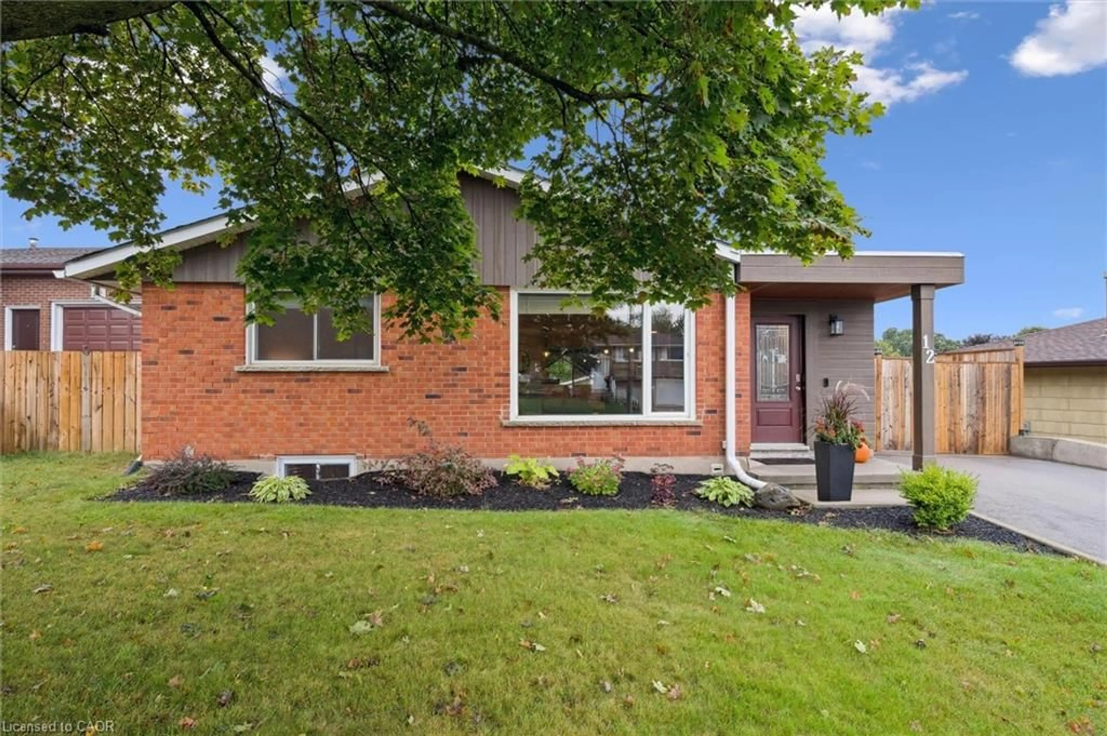 Home with brick exterior material, street for 12 Greenbrier Rd, Cambridge Ontario N1R 6M9