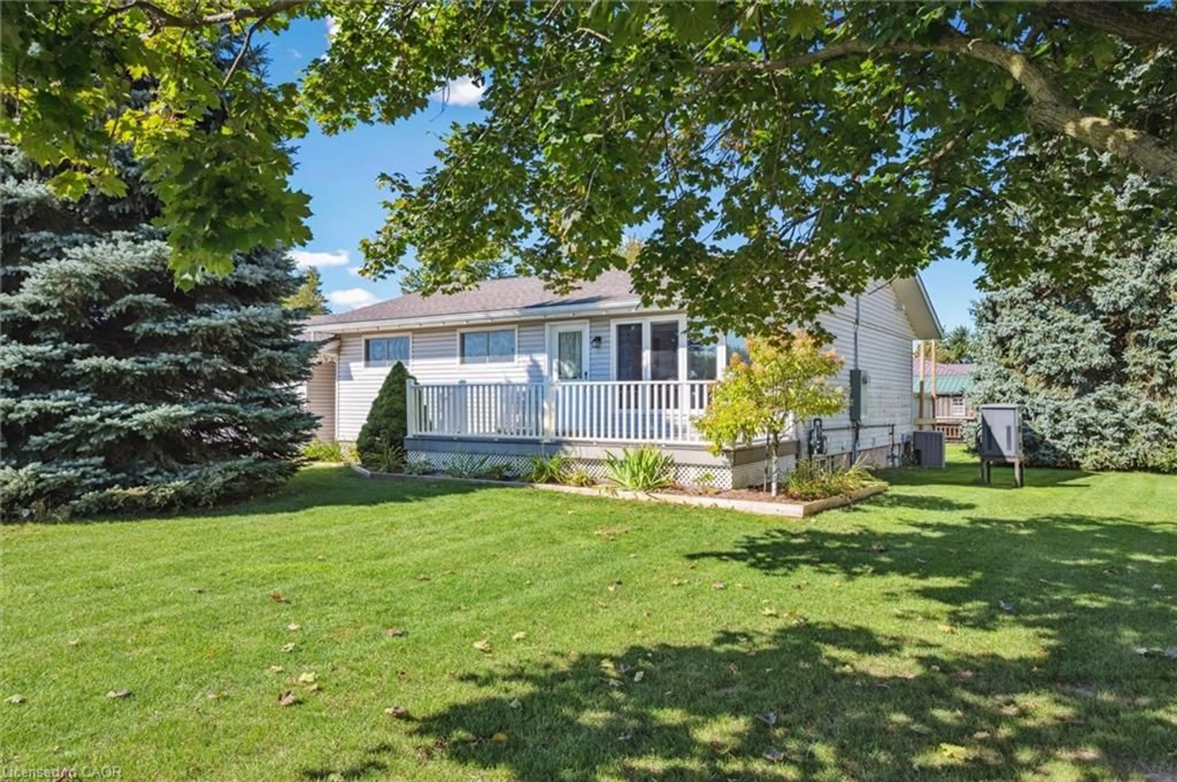 Home with vinyl exterior material, street for 5590 126 Road, Brunner Ontario N0K 1C0