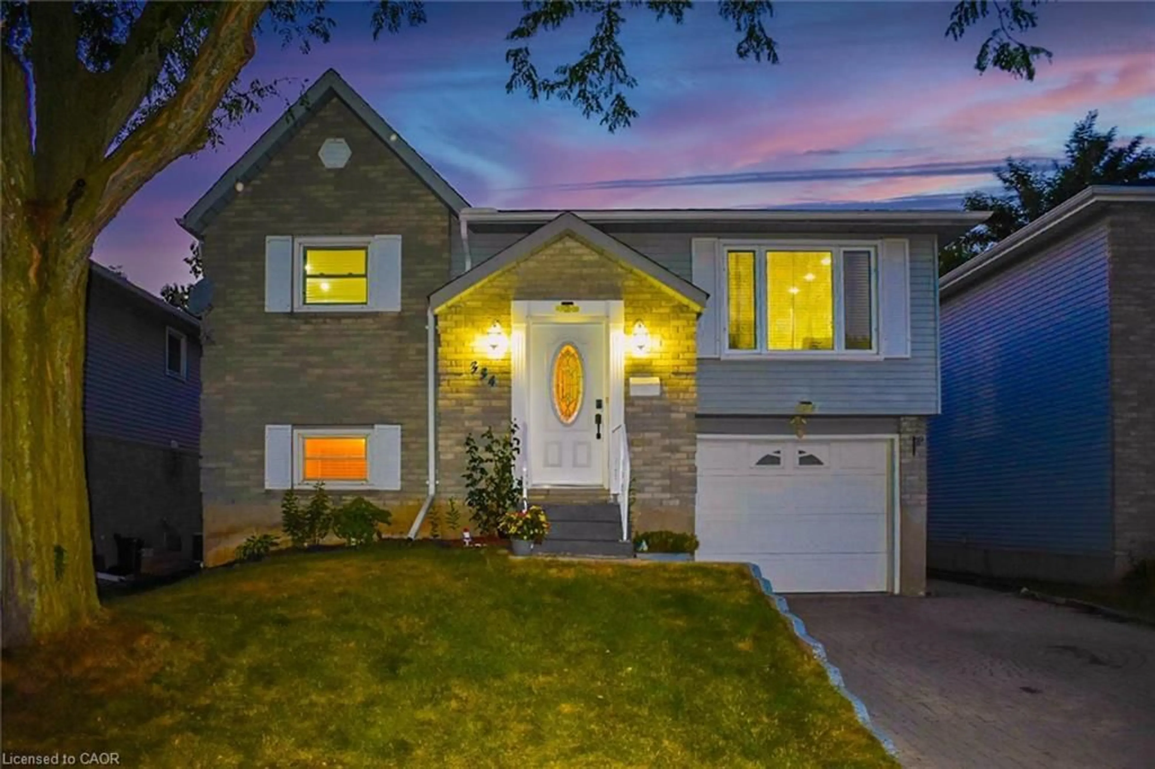 Home with vinyl exterior material, street for 334 Sekura St, Cambridge Ontario N1R 7W3