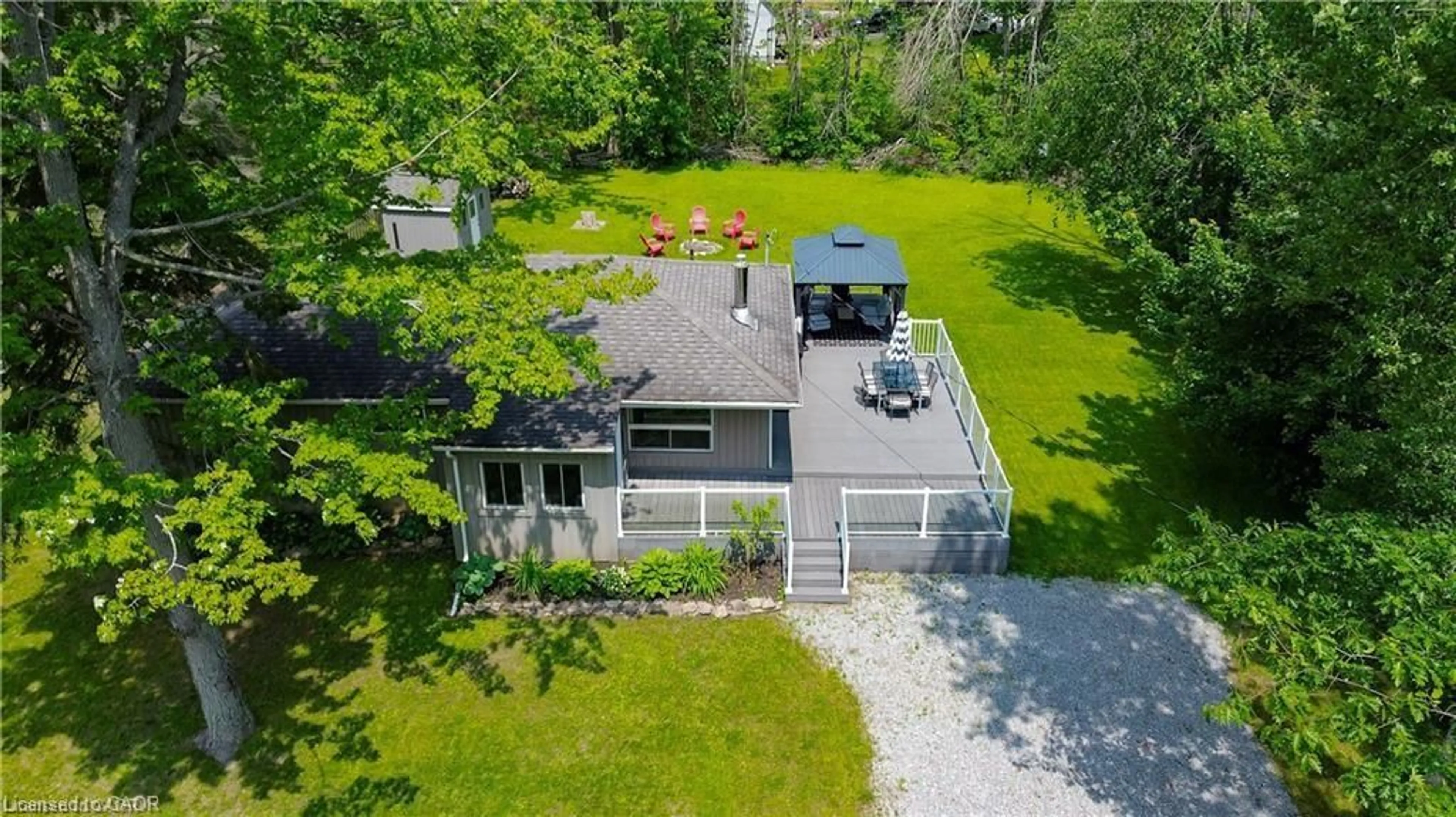 A pic from outside/outdoor area/front of a property/back of a property/a pic from drone, water/lake/river/ocean view for 25 Bayview Estate Rd, Fenelon Falls Ontario K0M 1N0