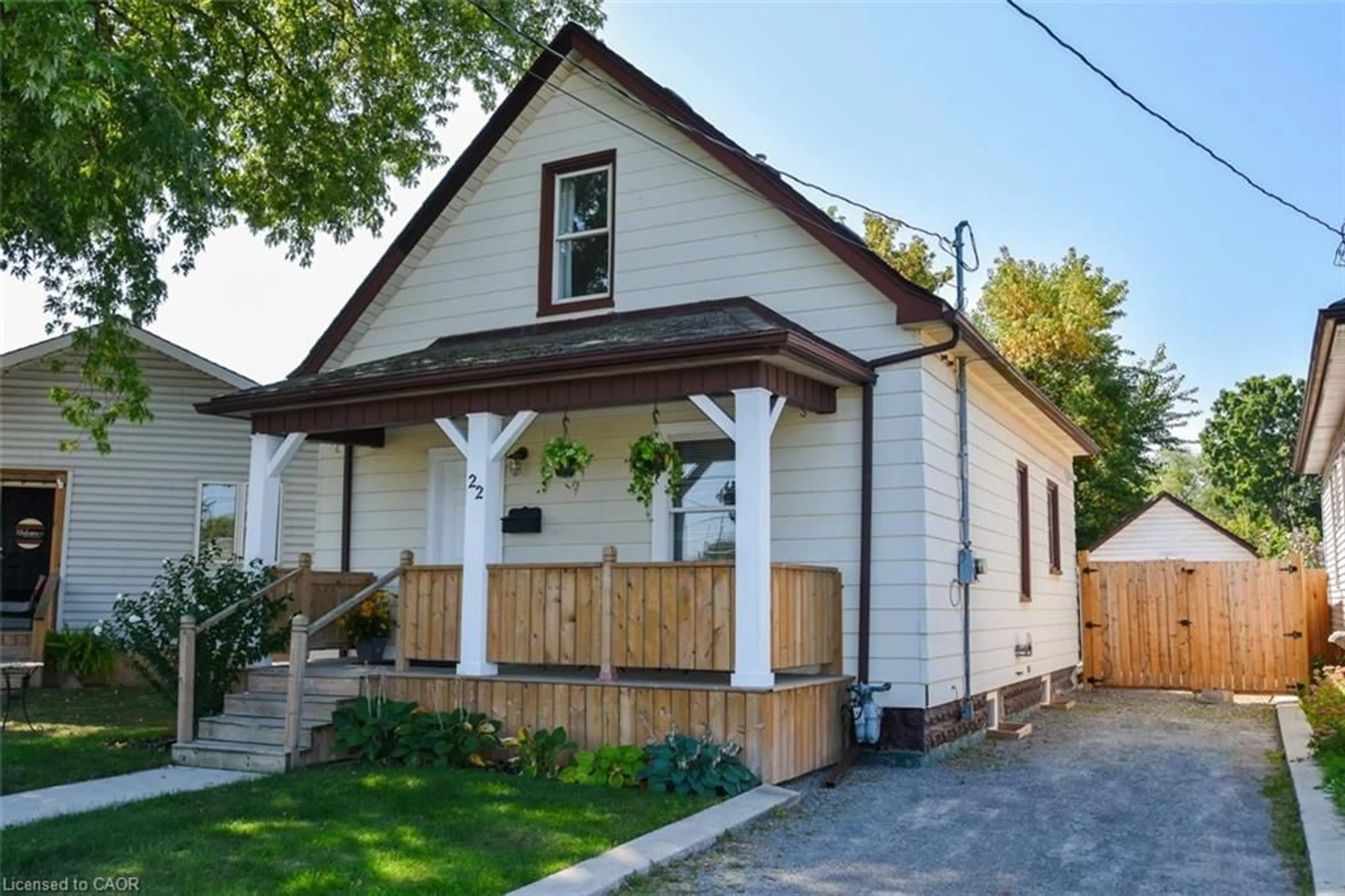 Home with vinyl exterior material, street for 22 Bertram St, St. Catharines Ontario L2R 1A8