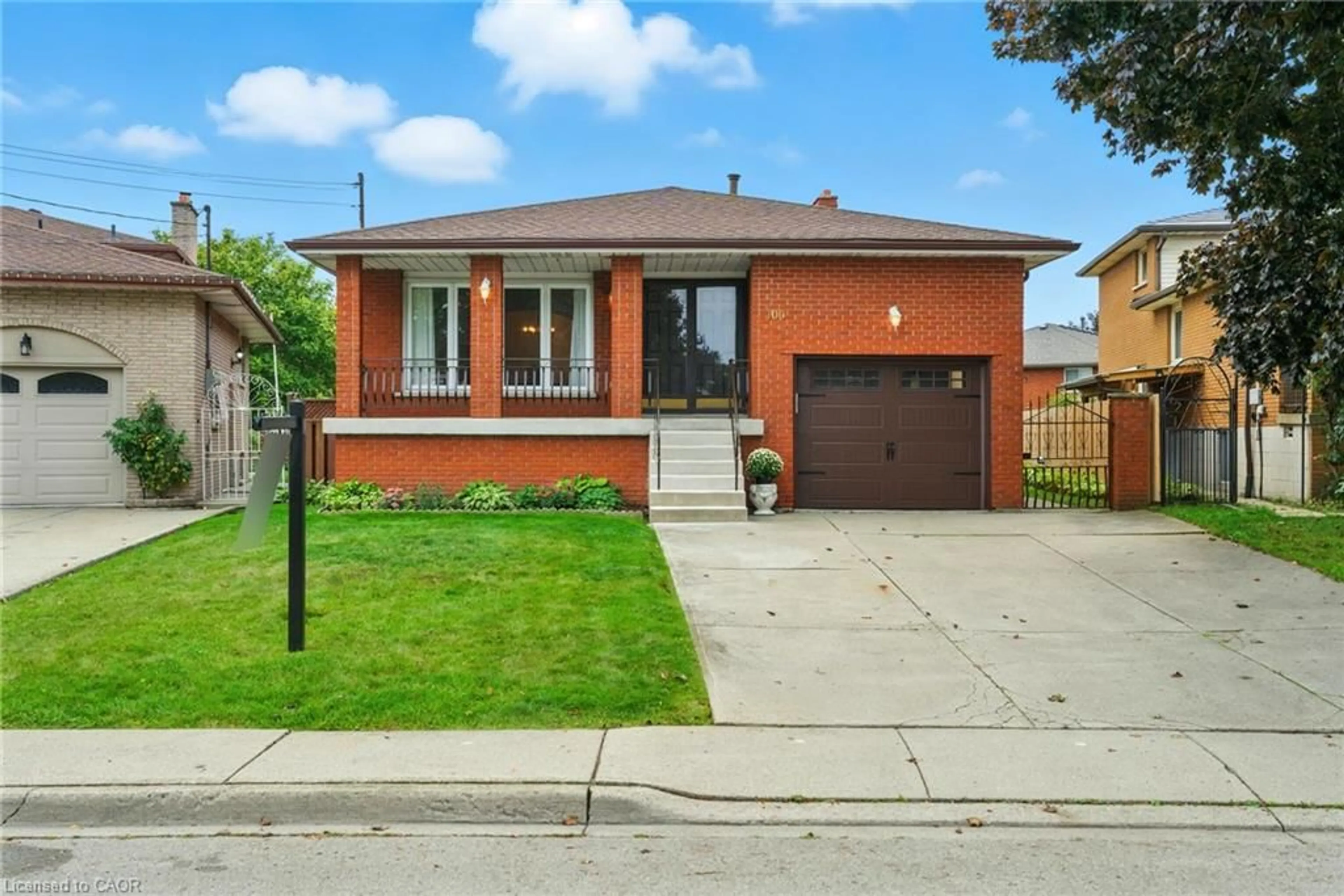 Home with brick exterior material, street for 100 Taymall St, Hamilton Ontario L8W 1Z4