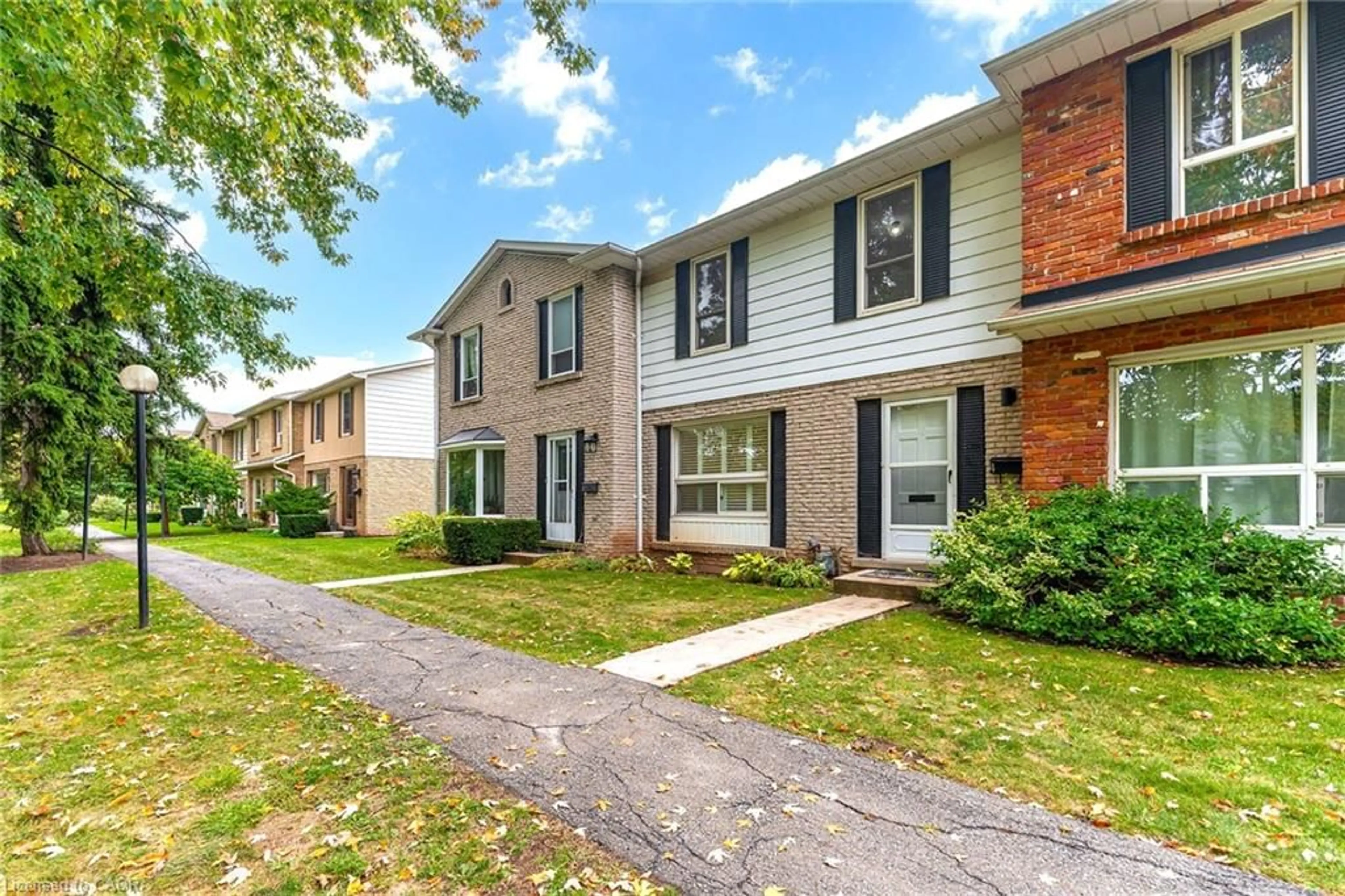Home with brick exterior material, street for 5475 Lakeshore Rd #4, Burlington Ontario L7L 1E1