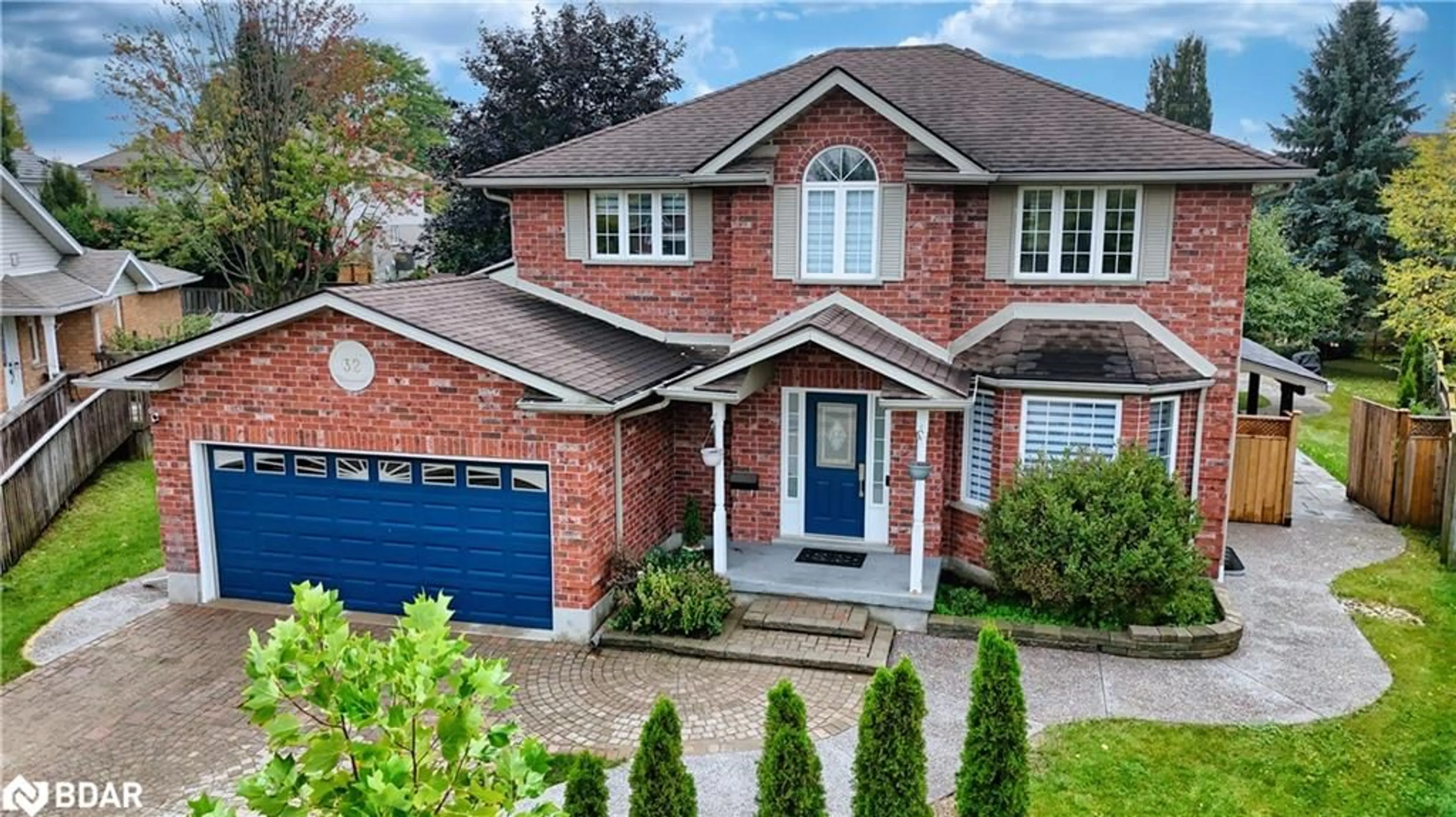 Home with brick exterior material, street for 32 Elsley Crt, Guelph Ontario N1C 1C8