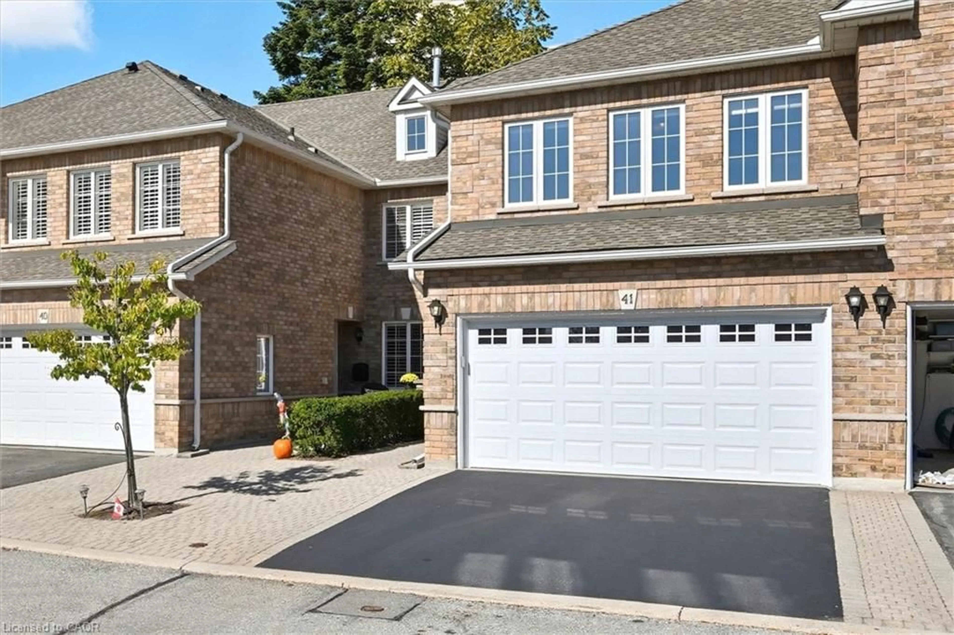Home with brick exterior material, street for 3045 New St #41, Burlington Ontario L7N 3V9