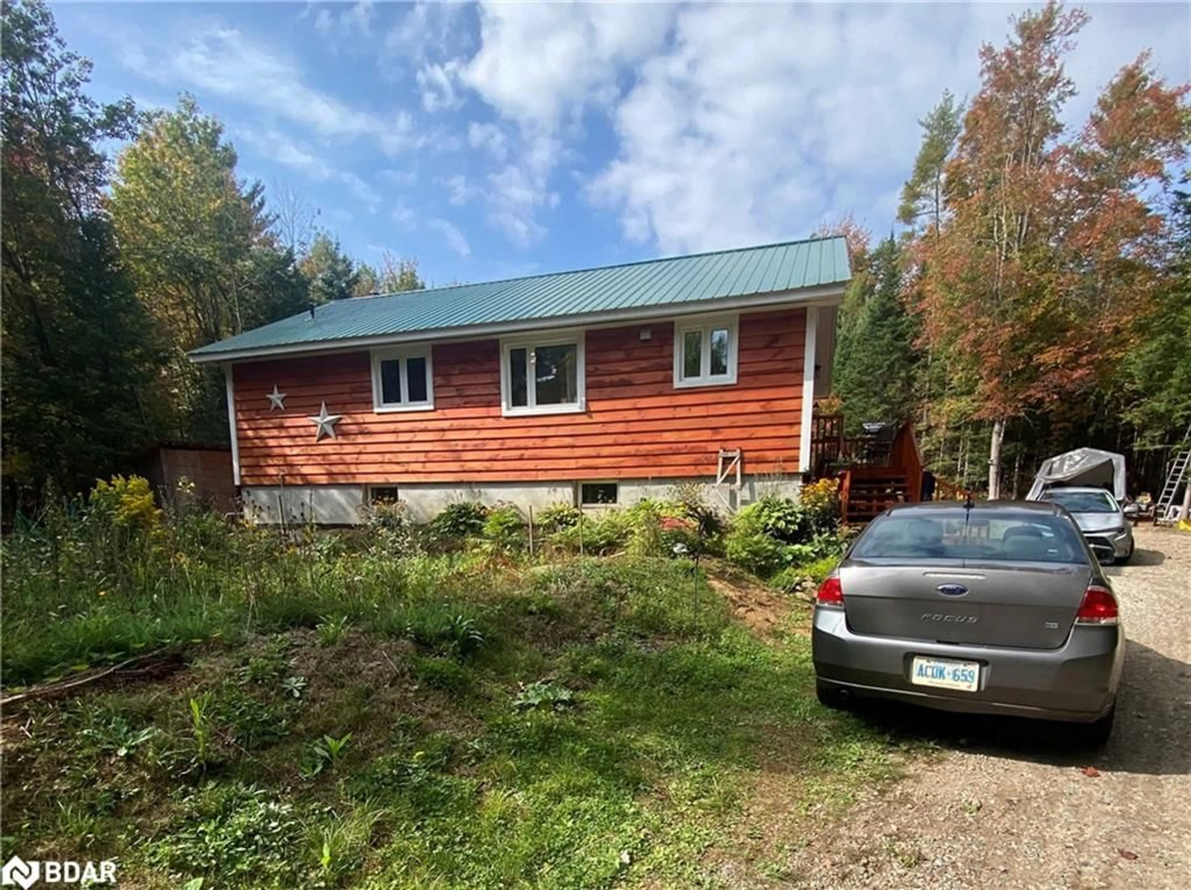 A pic from outside/outdoor area/front of a property/back of a property/a pic from drone, unknown for 1070 Vankoughnet Road Rd, Bracebridge Ontario P1L 1X1