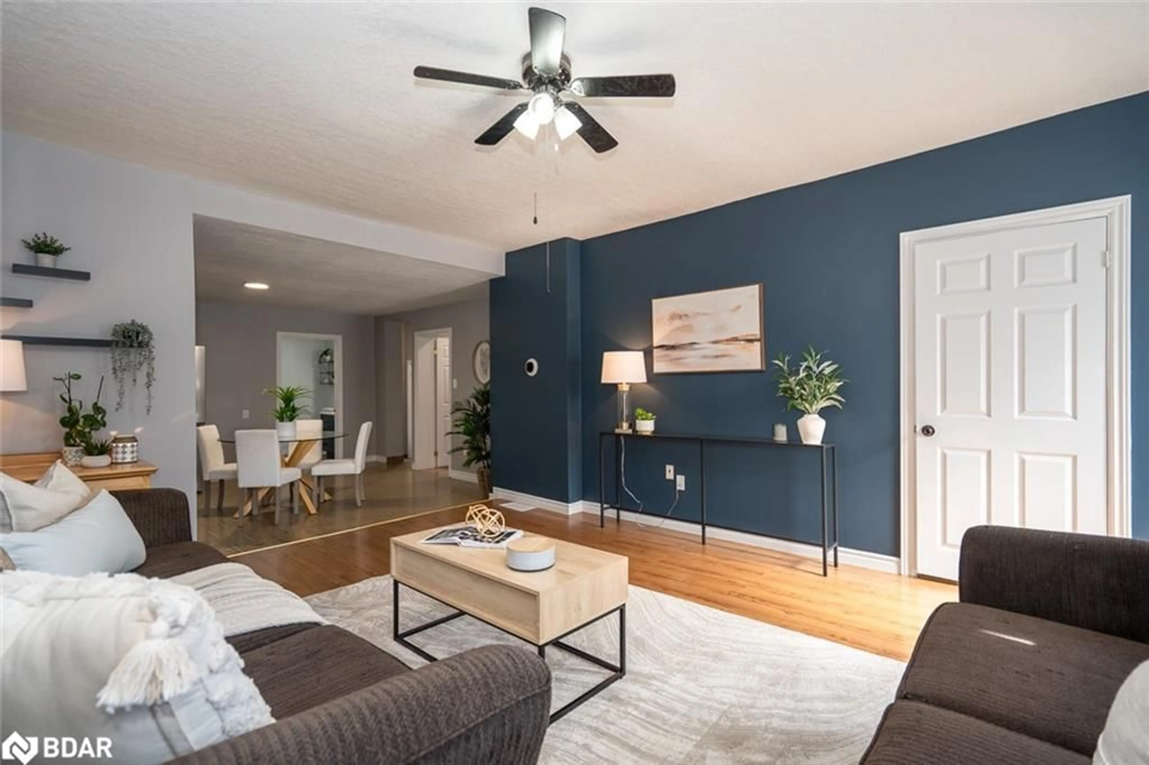 Living room with furniture, wood/laminate floor for 131 Frederick Street East St, Arthur Ontario N0G 1A0