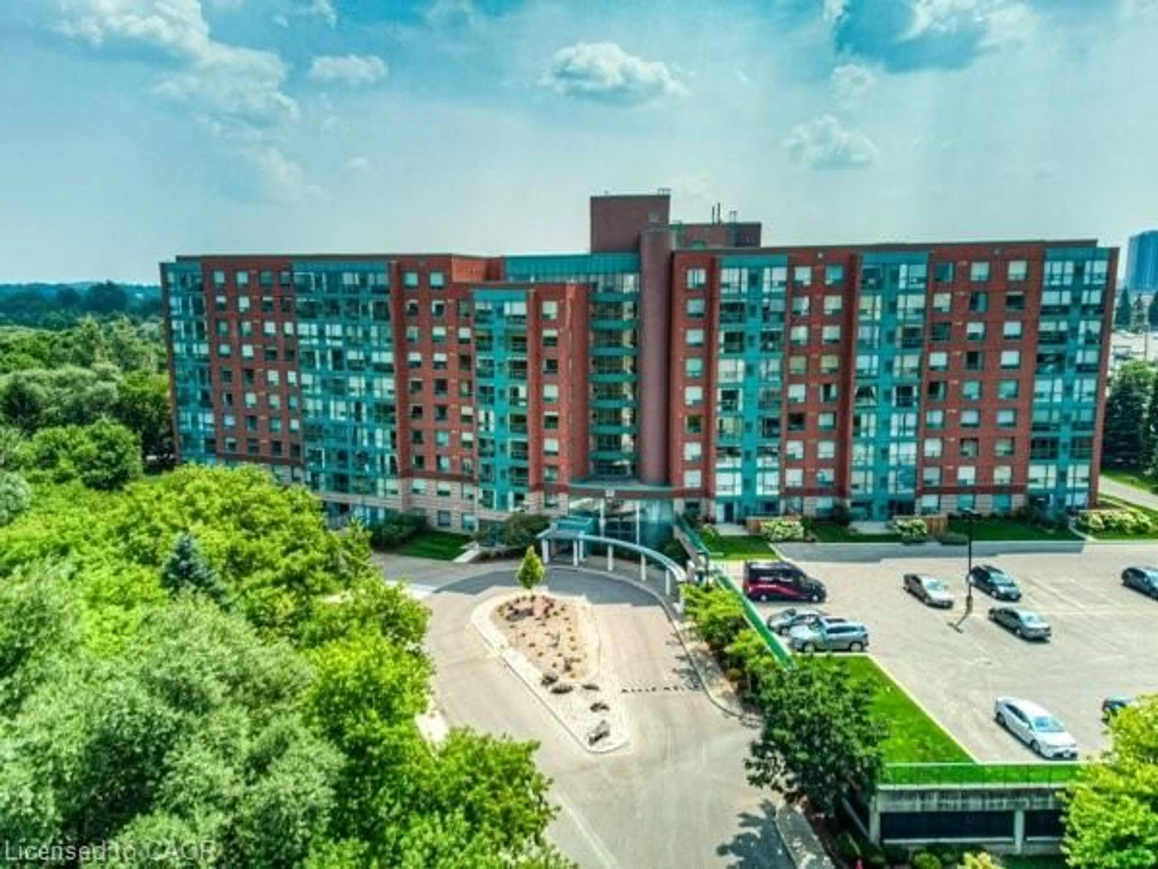 A pic from outside/outdoor area/front of a property/back of a property/a pic from drone, city buildings view from balcony for 55 Blue Springs Dr #512, Waterloo Ontario N2J 4T3