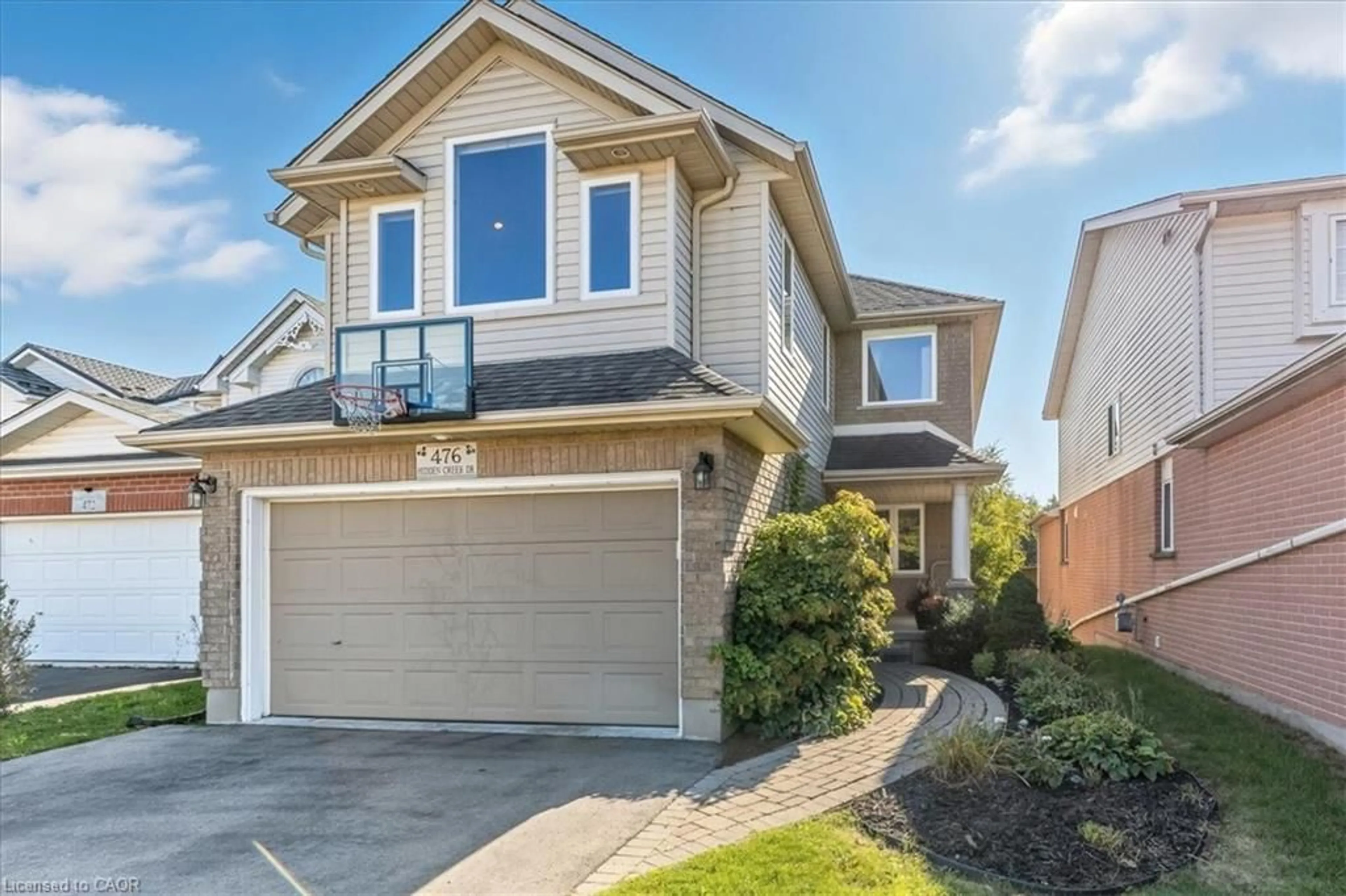 Home with brick exterior material, street for 476 Hidden Creek Dr, Kitchener Ontario N2N 3M1