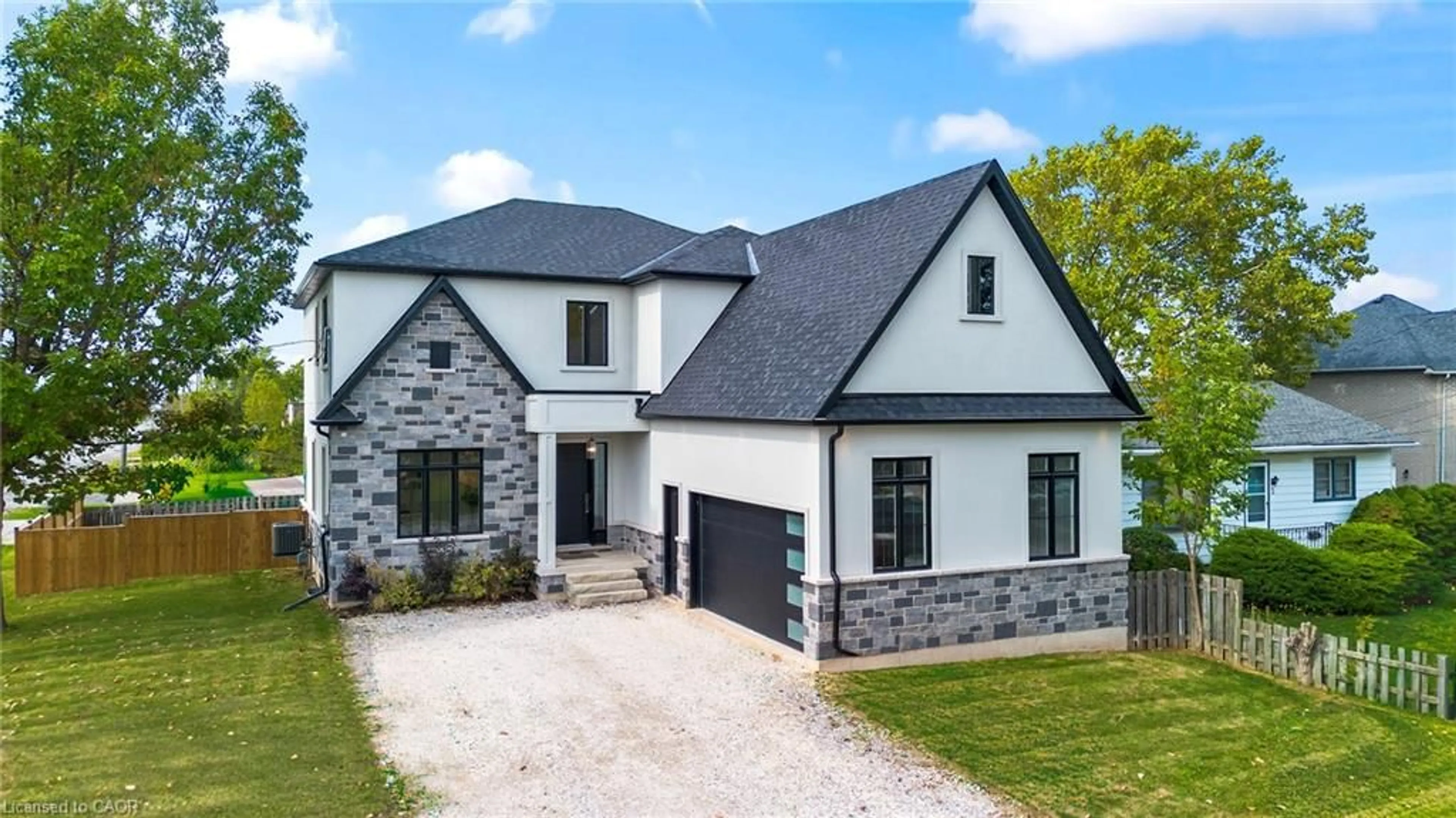 Home with brick exterior material, street for 1 West Ave, Hamilton Ontario L8E 5L5