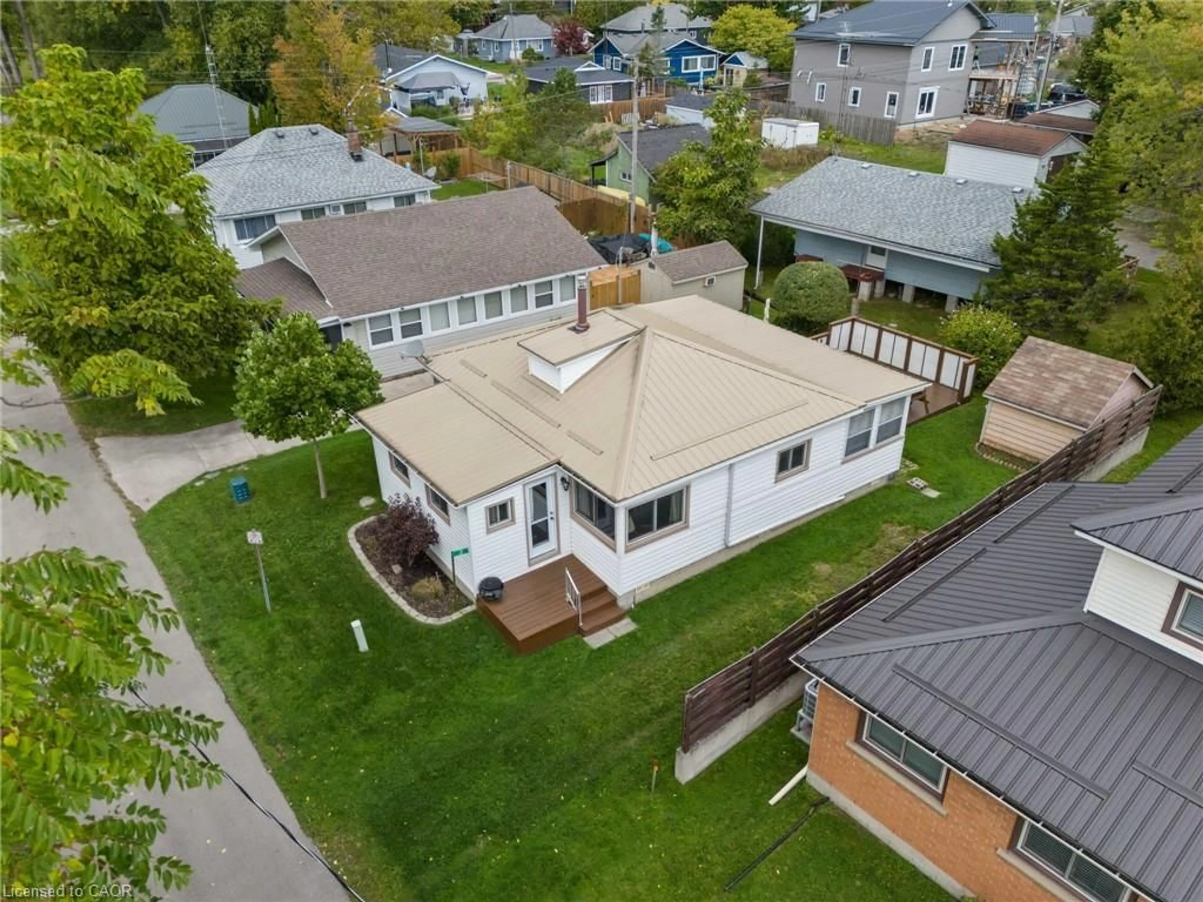 A pic from outside/outdoor area/front of a property/back of a property/a pic from drone, street for 3 Harold St, Turkey Point Ontario N0E 1T0
