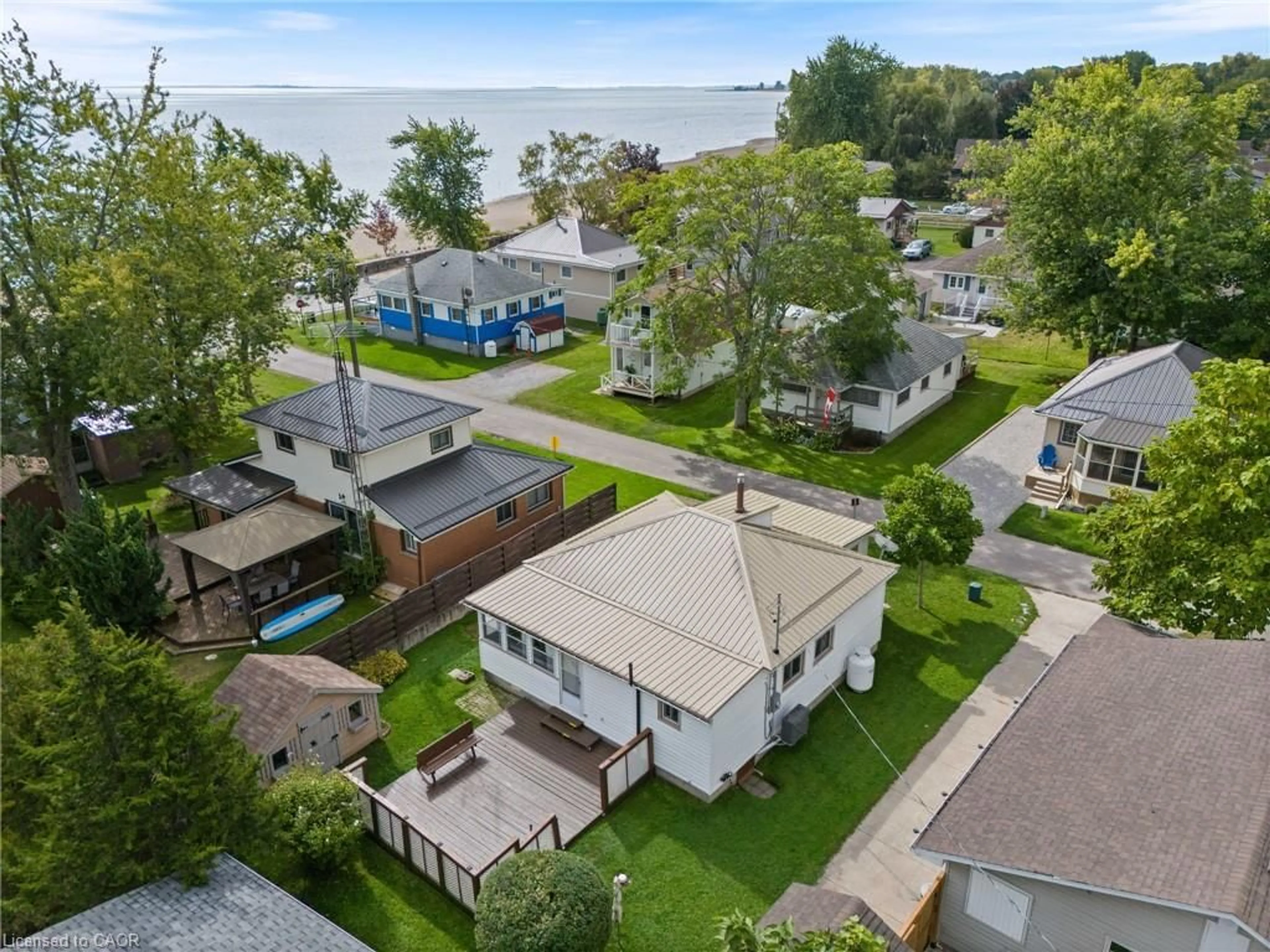 A pic from outside/outdoor area/front of a property/back of a property/a pic from drone, water/lake/river/ocean view for 3 Harold St, Turkey Point Ontario N0E 1T0