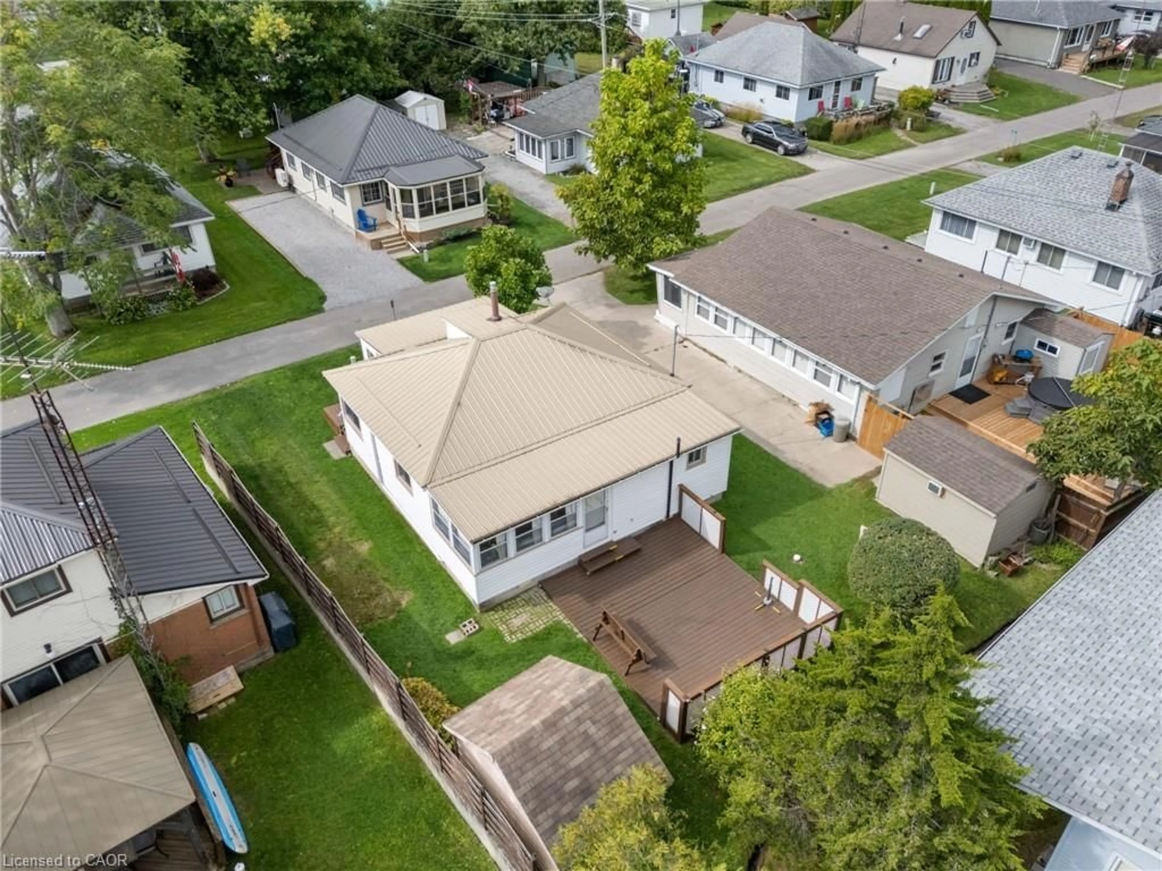 A pic from outside/outdoor area/front of a property/back of a property/a pic from drone, street for 3 Harold St, Turkey Point Ontario N0E 1T0