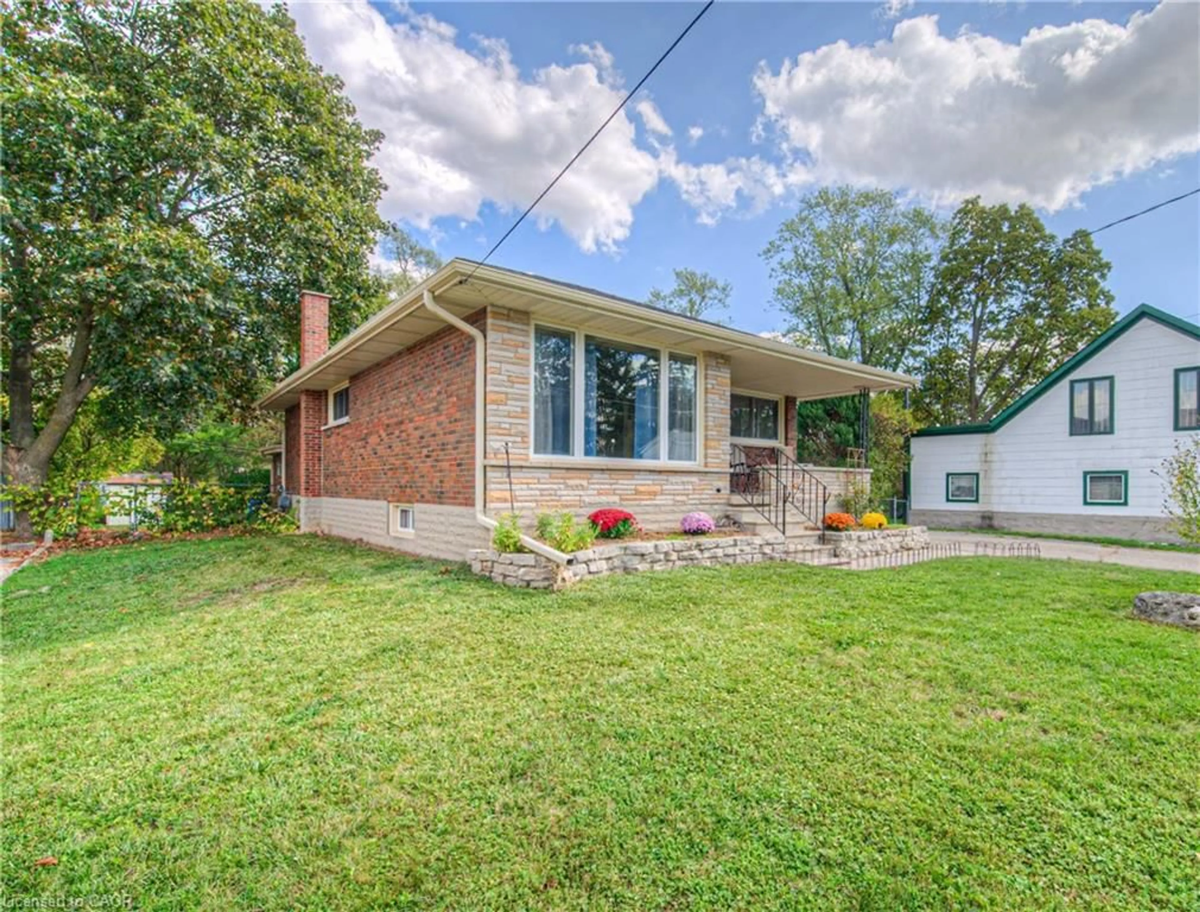 Home with brick exterior material, street for 24 Prince St, Kitchener Ontario N2K 1J1