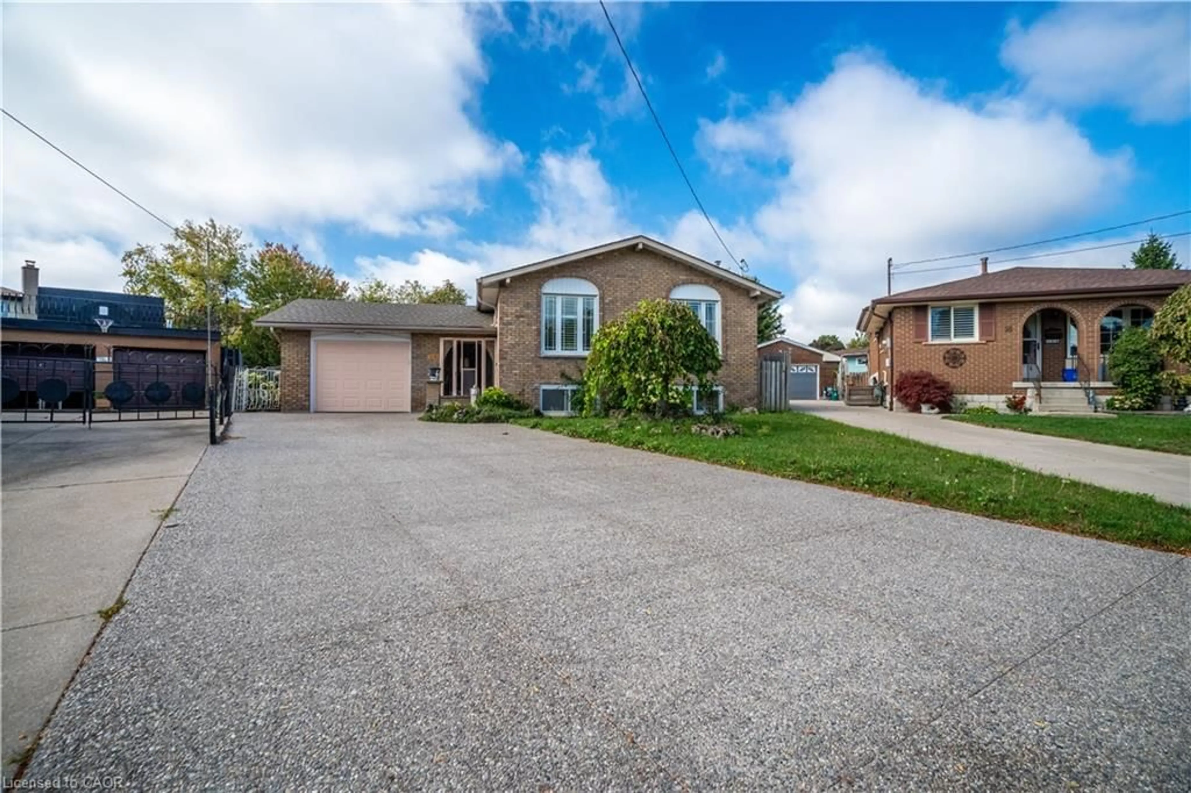 A pic from outside/outdoor area/front of a property/back of a property/a pic from drone, street for 18 Villa Crt, Hamilton Ontario L8W 1M2