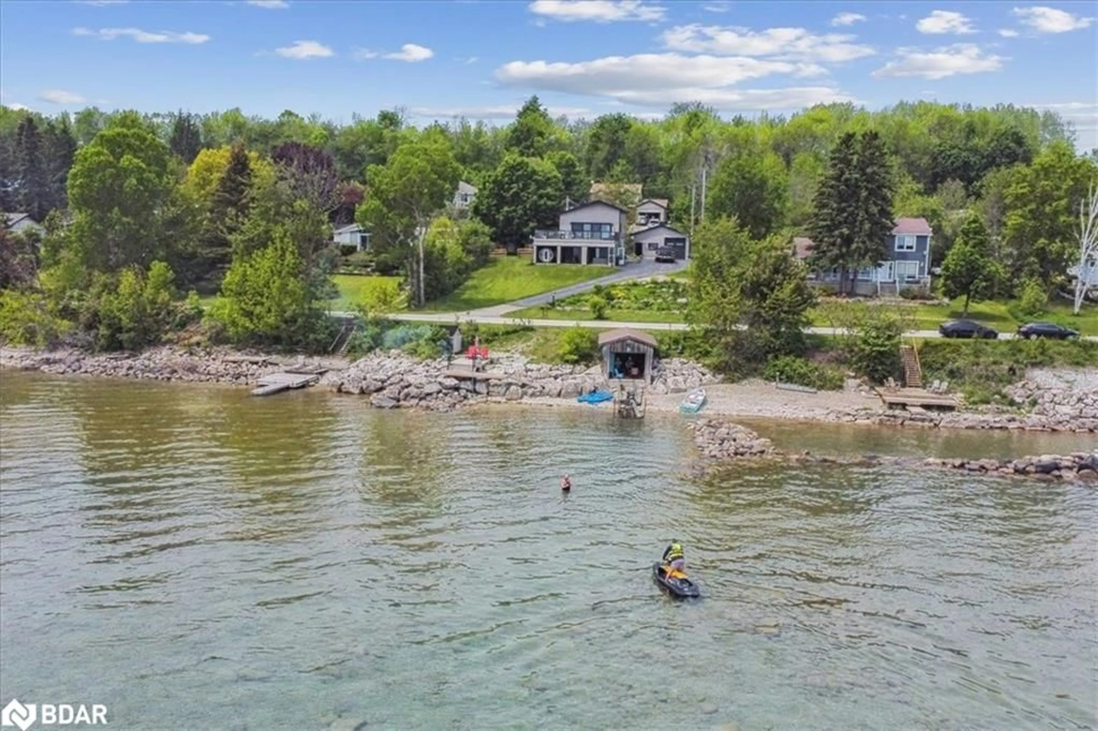 A pic from outside/outdoor area/front of a property/back of a property/a pic from drone, water/lake/river/ocean view for 339520 Presqu'ile Rd, Georgian Bluffs Ontario N0H 2T0