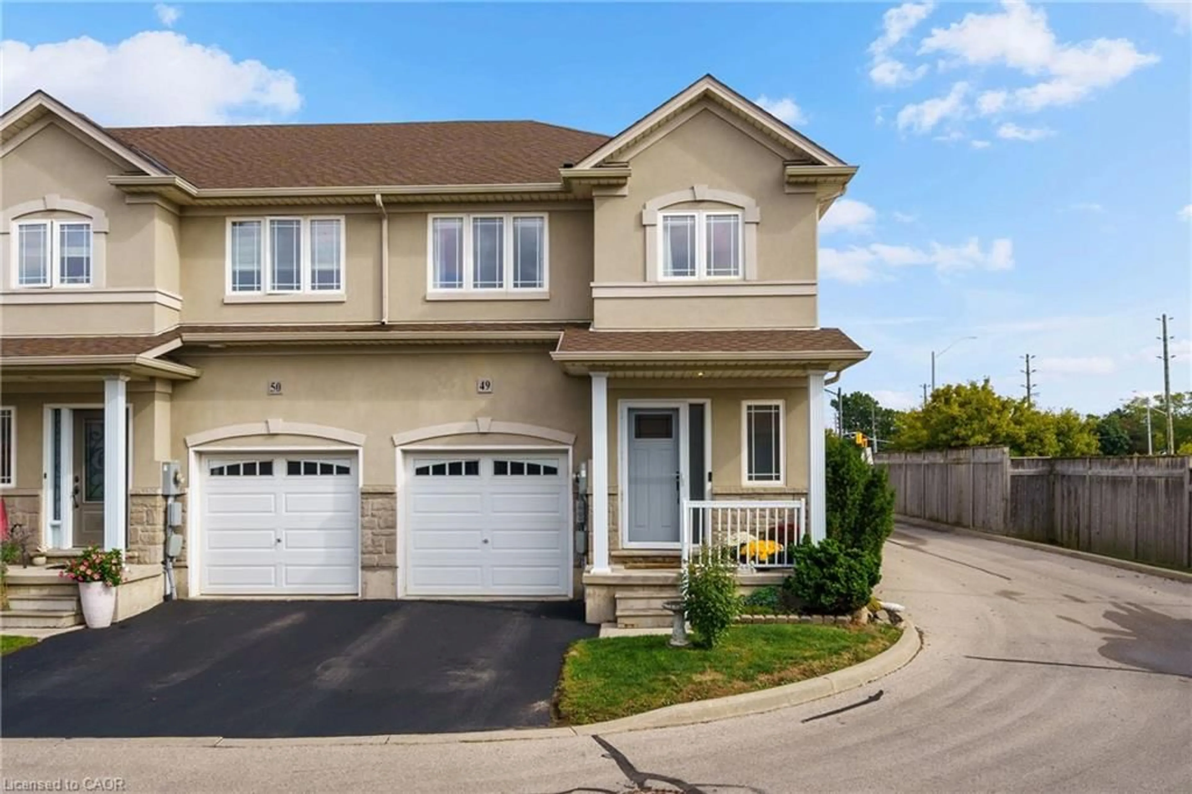 Home with vinyl exterior material, street for 615 Rymal Rd #49, Hamilton Ontario L8W 0B6