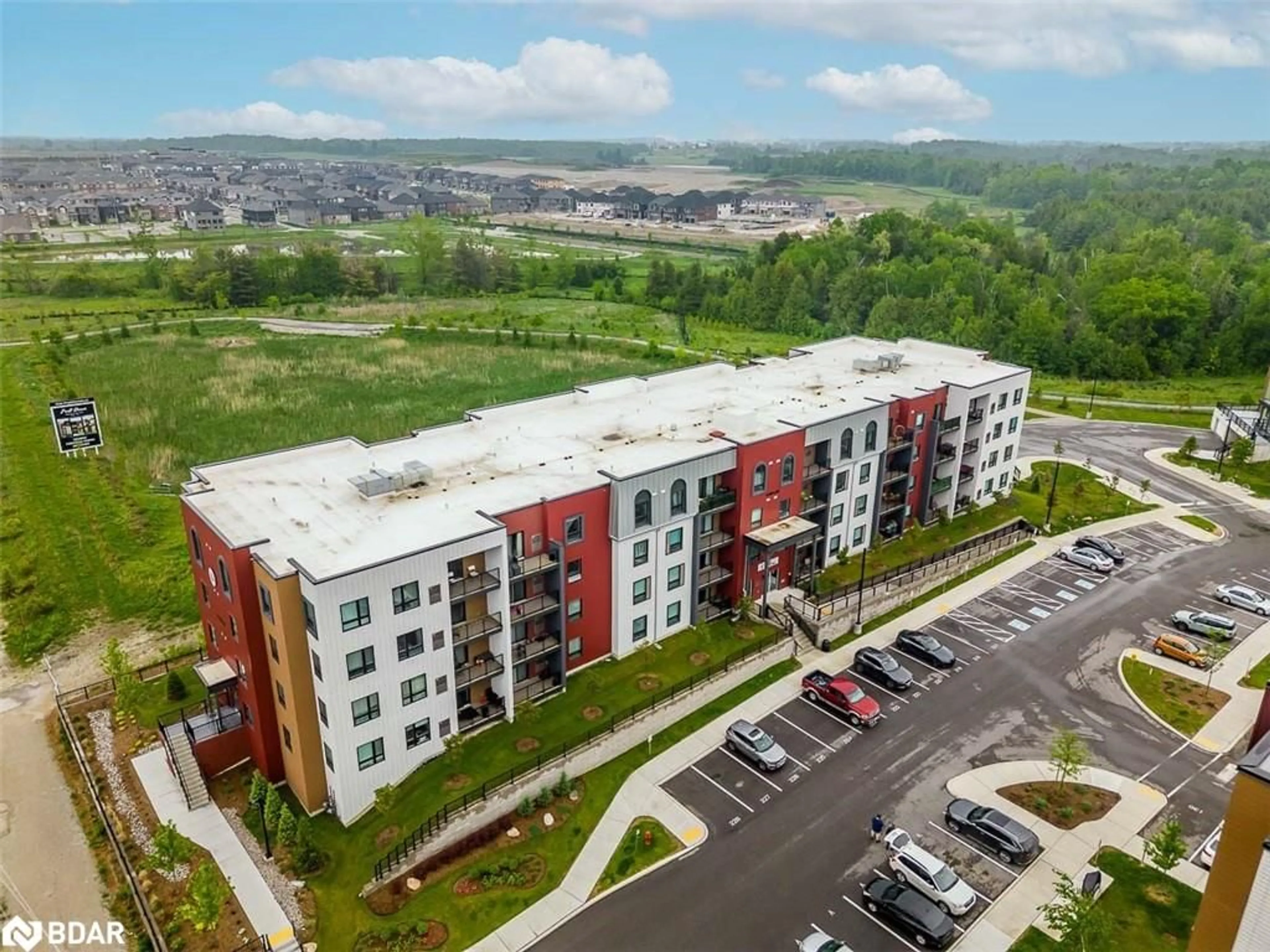 A pic from outside/outdoor area/front of a property/back of a property/a pic from drone, building for 1 Chef Lane #207, Barrie Ontario L9J 0T1