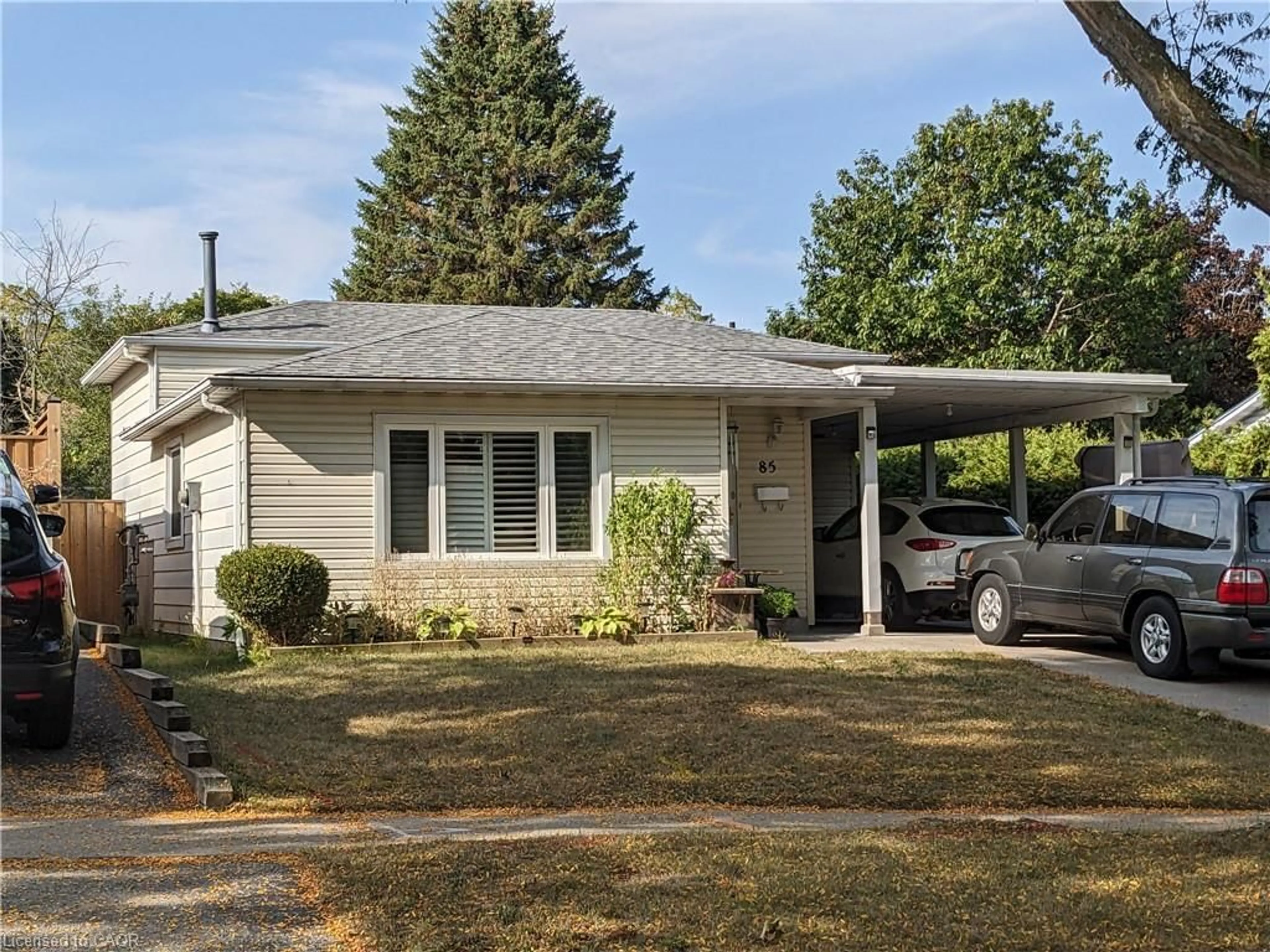 Home with vinyl exterior material, street for 85 Christopher Dr, Waterloo Ontario N2J 4J6