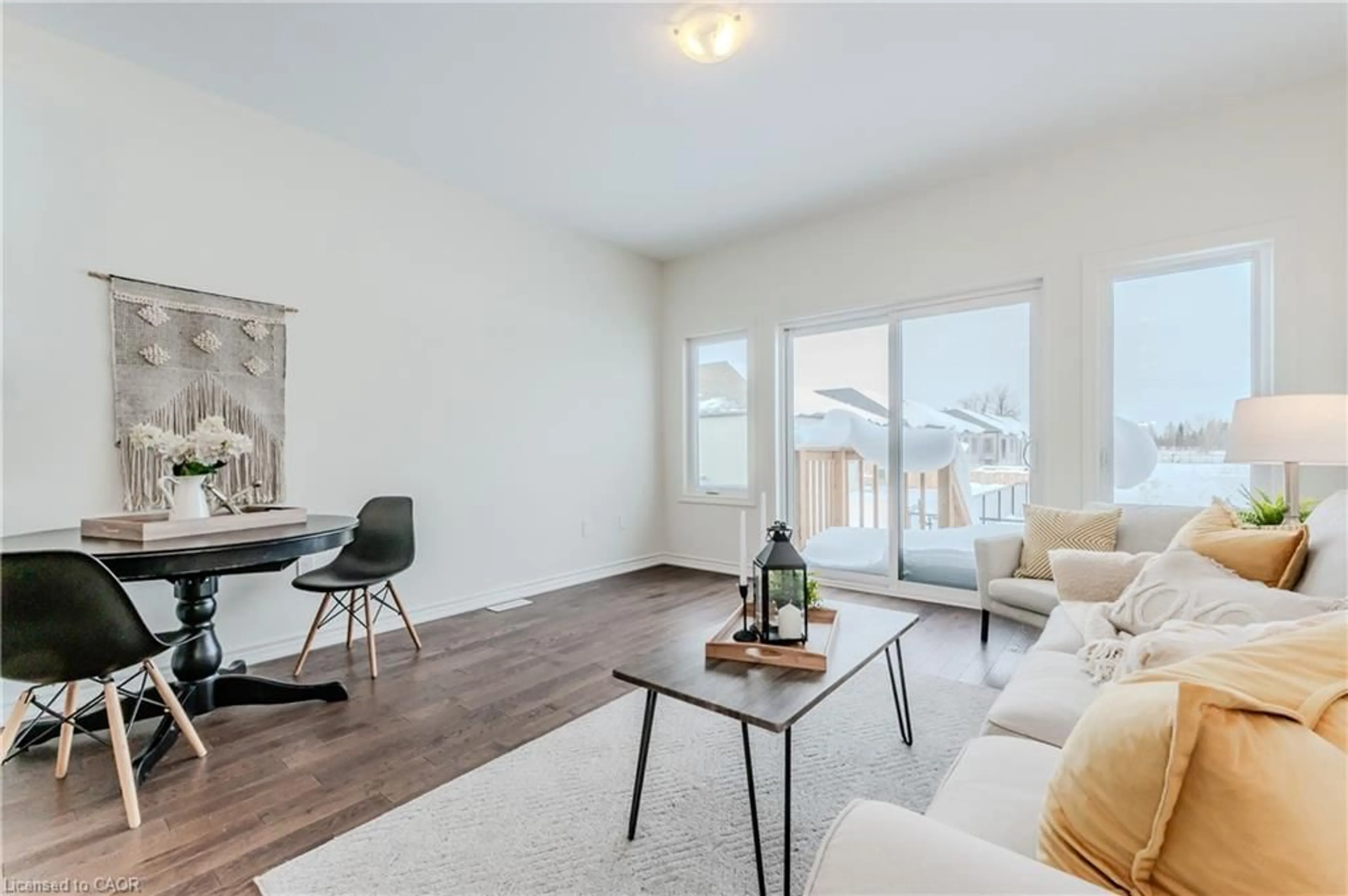Living room with furniture, wood/laminate floor for 104 Cheryl Ave, Atwood Ontario N0G 1B0
