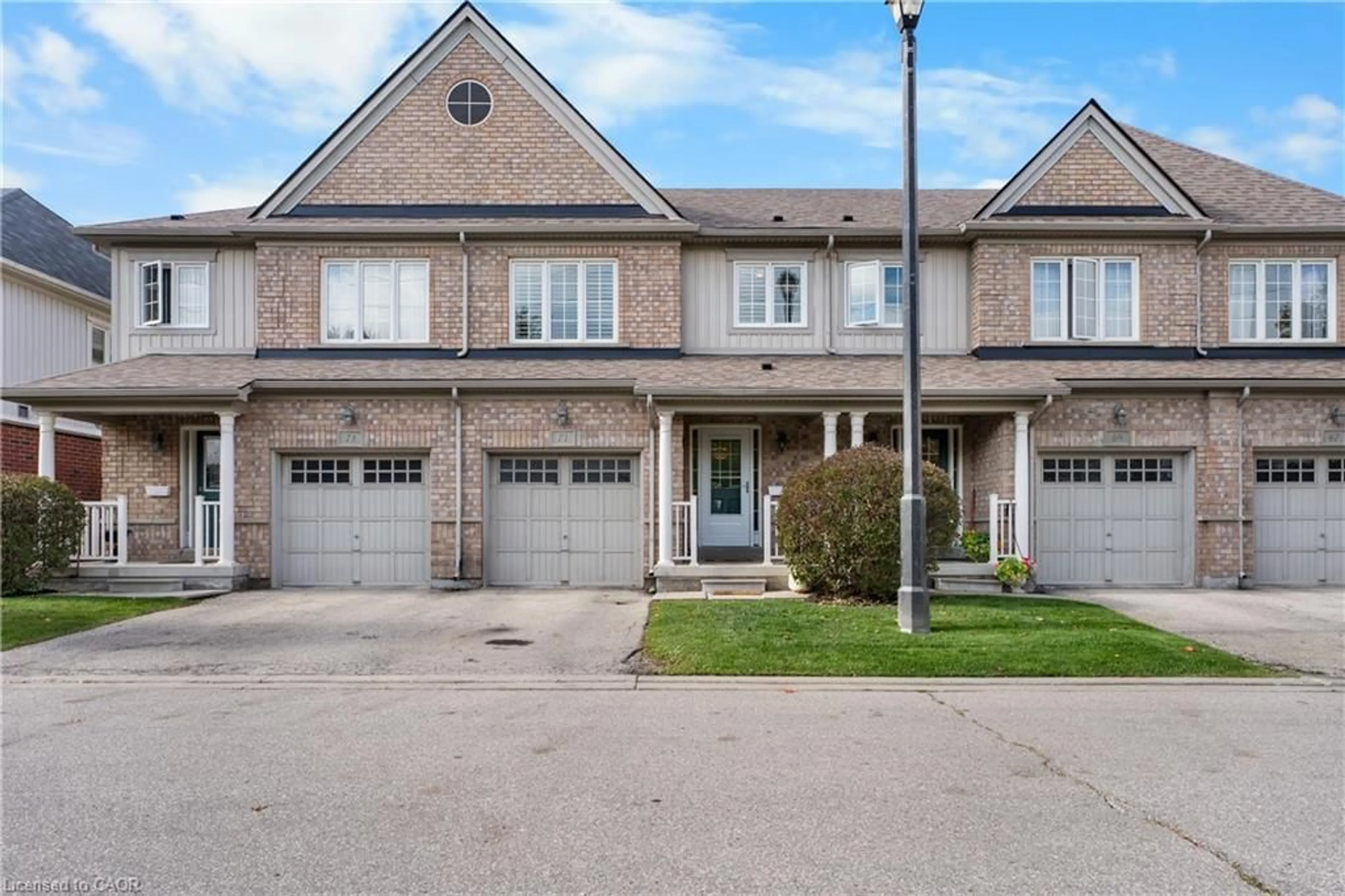 Home with brick exterior material, street for 1035 Victoria Road South St #71, Guelph Ontario N1L 0H5