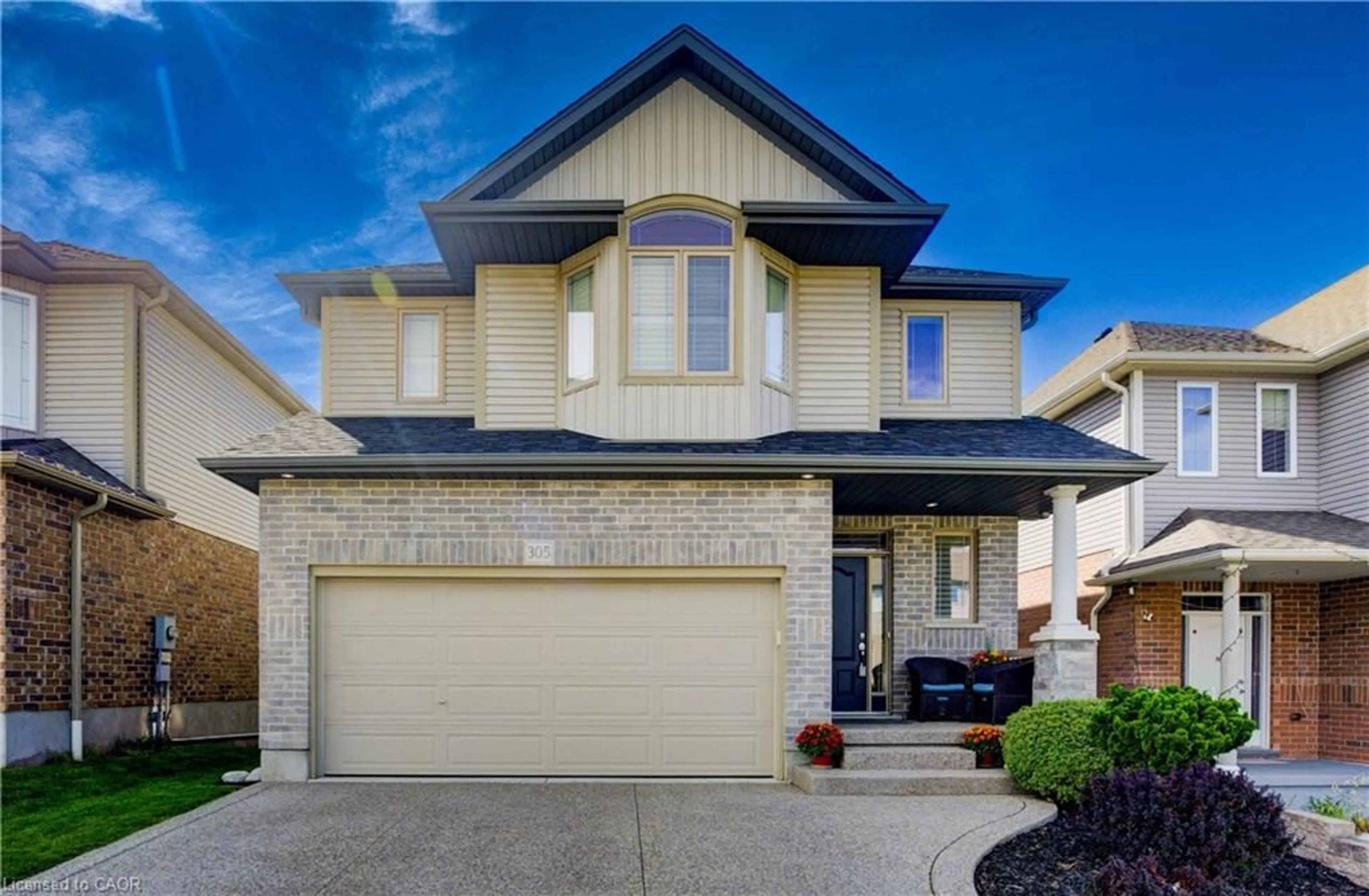 Home with brick exterior material, street for 305 Thornhill Pl, Waterloo Ontario N2T 0A9