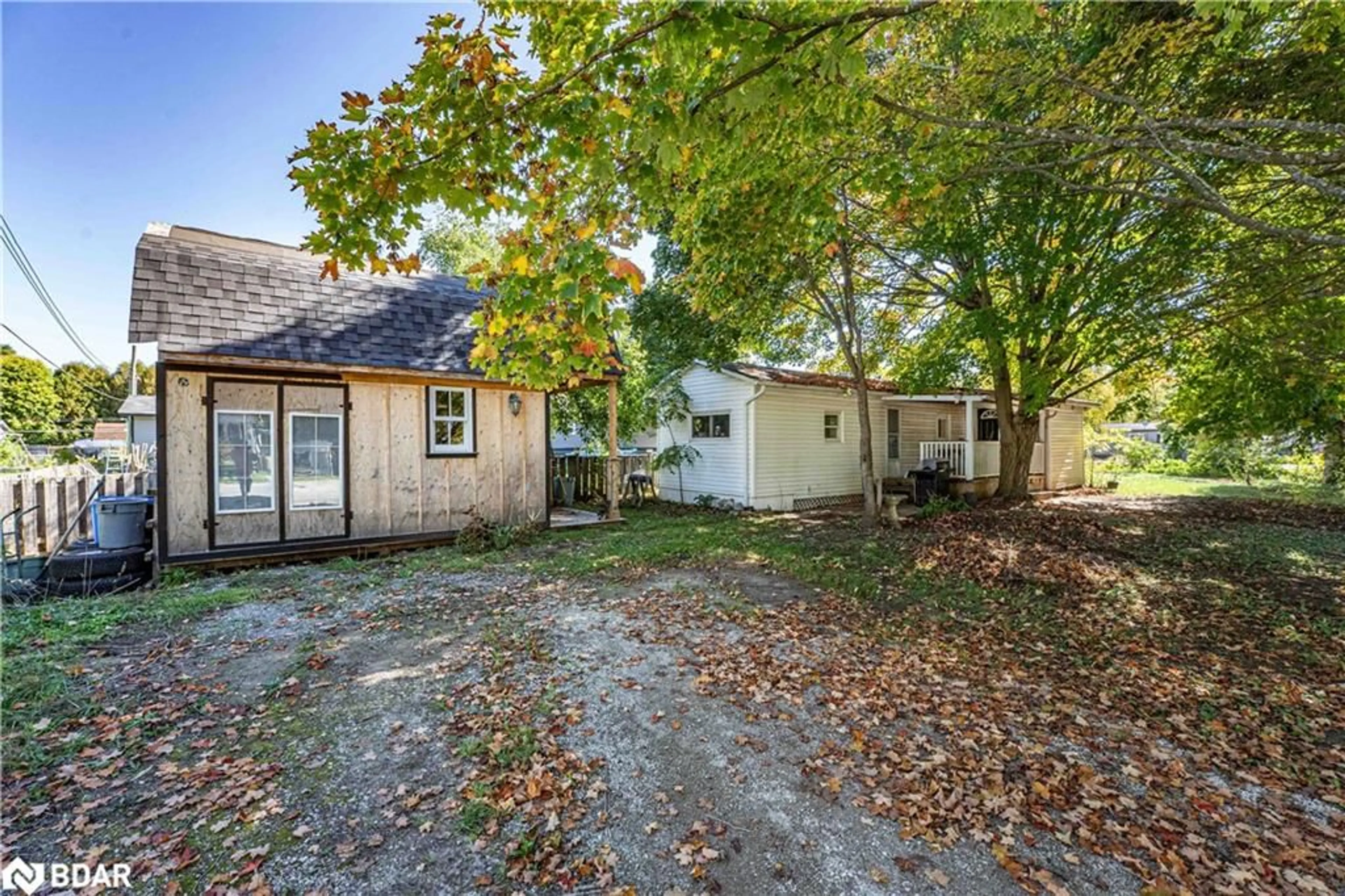 A pic from outside/outdoor area/front of a property/back of a property/a pic from drone, street for 2 East St, Angus Ontario L3W 0A5