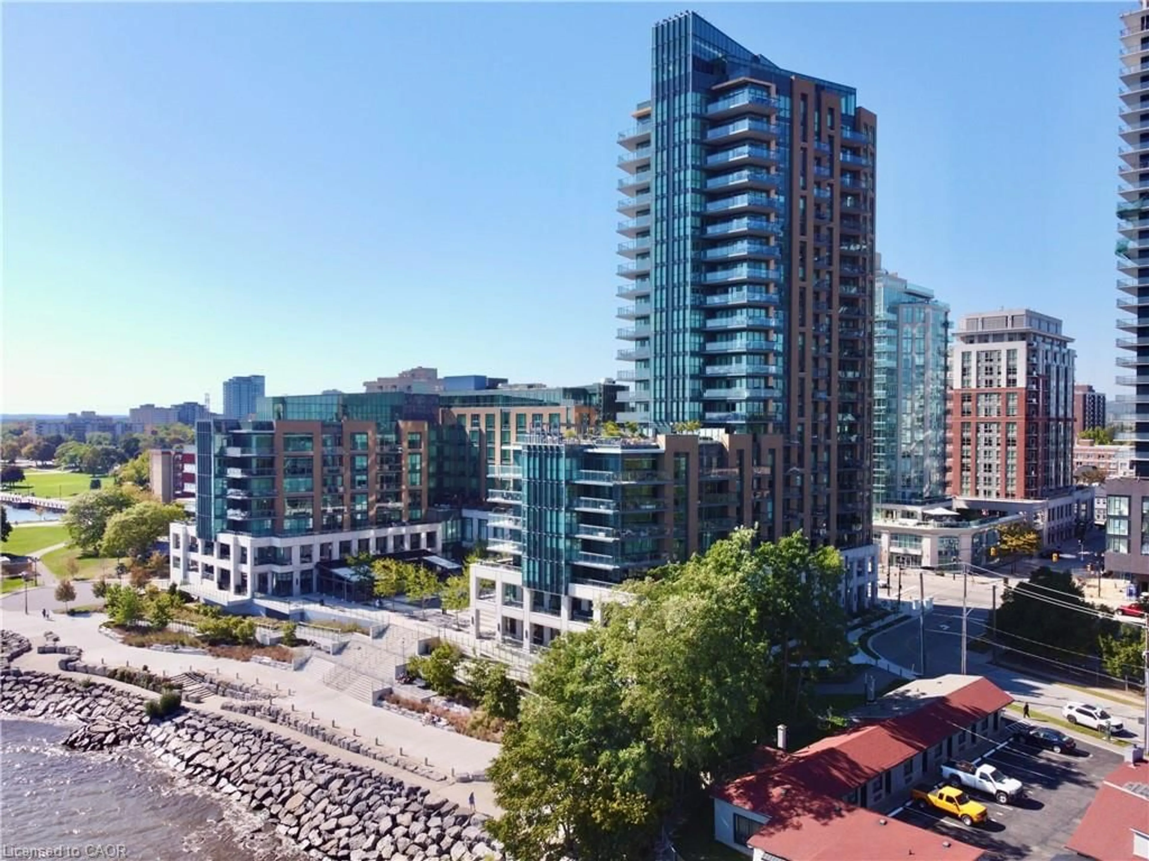 A pic from outside/outdoor area/front of a property/back of a property/a pic from drone, city buildings view from balcony for 2060 Lakeshore Rd #405, Burlington Ontario L7R 0G2