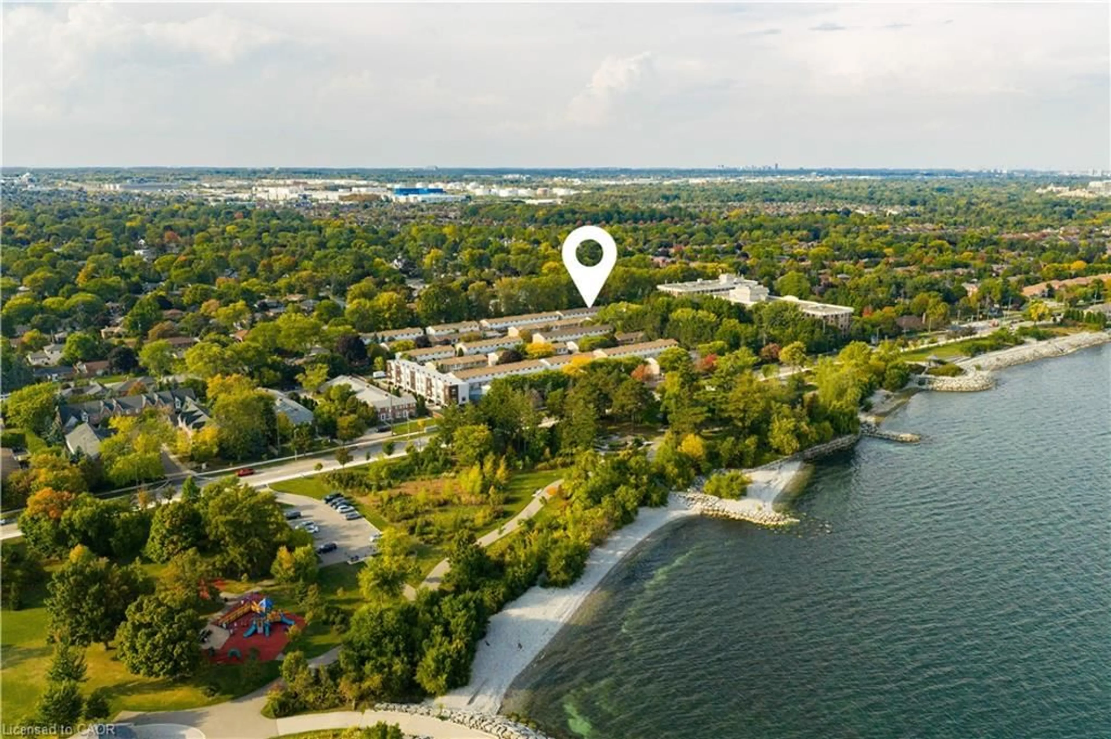A pic from outside/outdoor area/front of a property/back of a property/a pic from drone, water/lake/river/ocean view for 5475 Lakeshore Rd #19, Burlington Ontario L7L 1E1